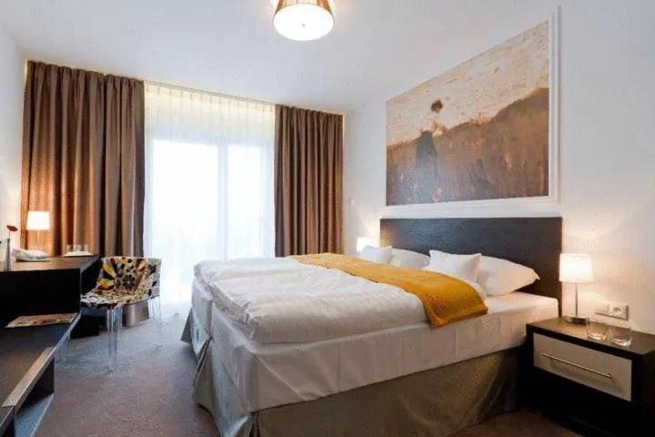 Bed in Hotel Mousson