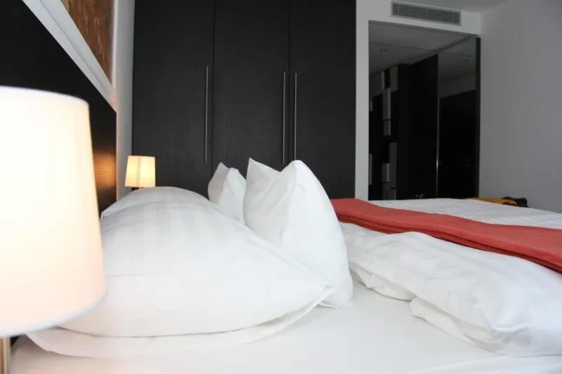 Bed in Hotel Mousson