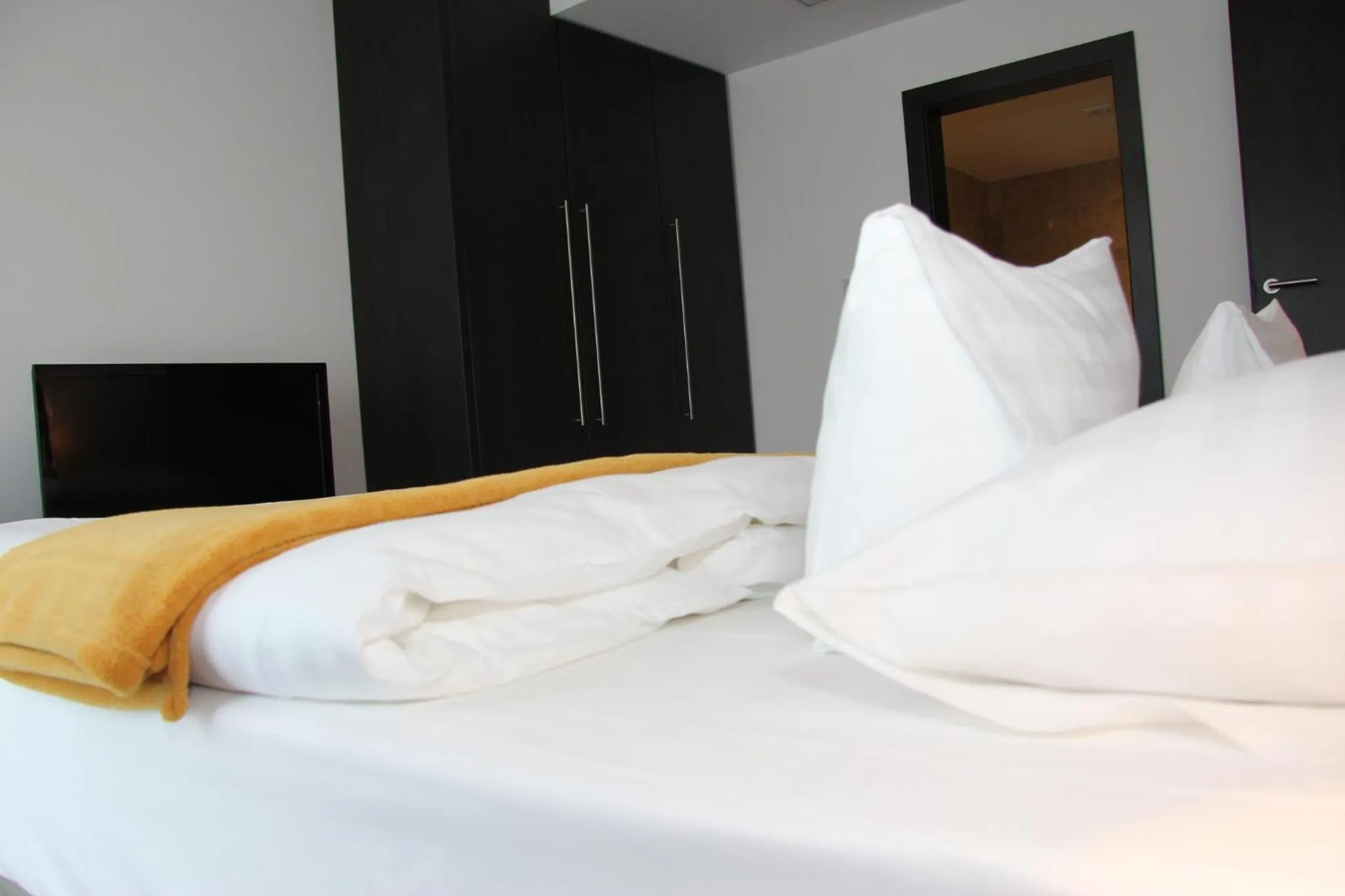 Bed in Hotel Mousson