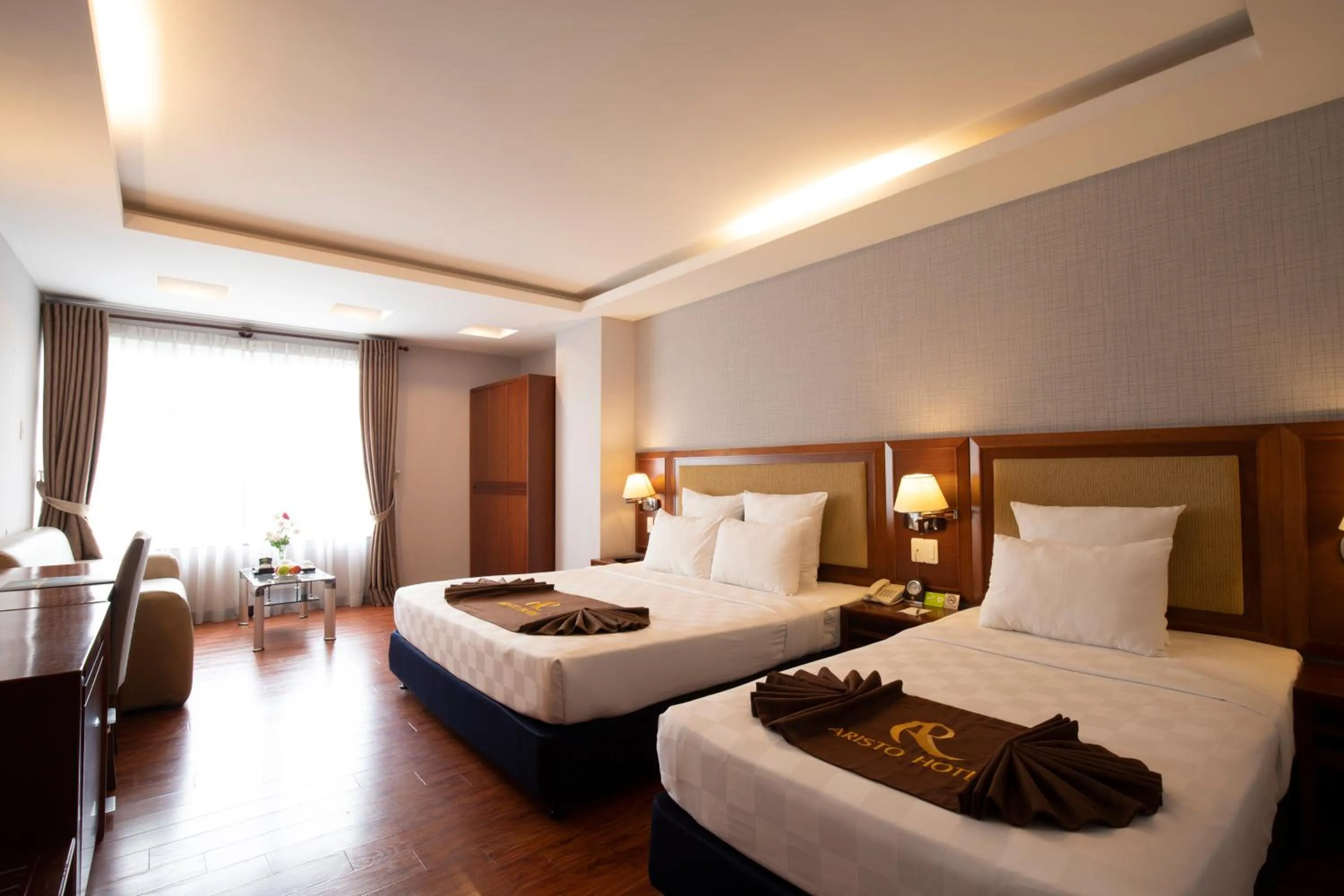 Bed in Aristo Saigon Hotel