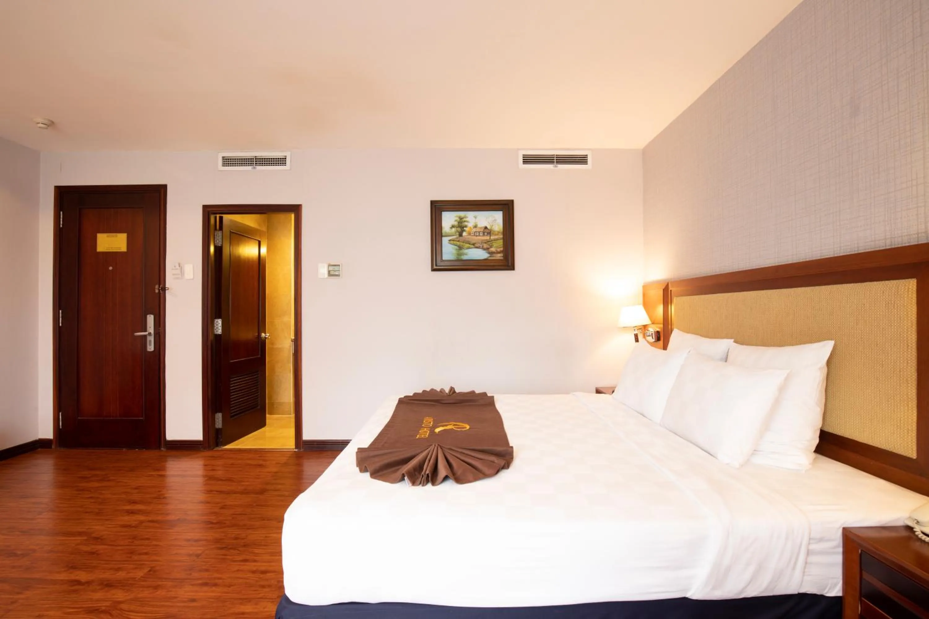 Bed in Aristo Saigon Hotel