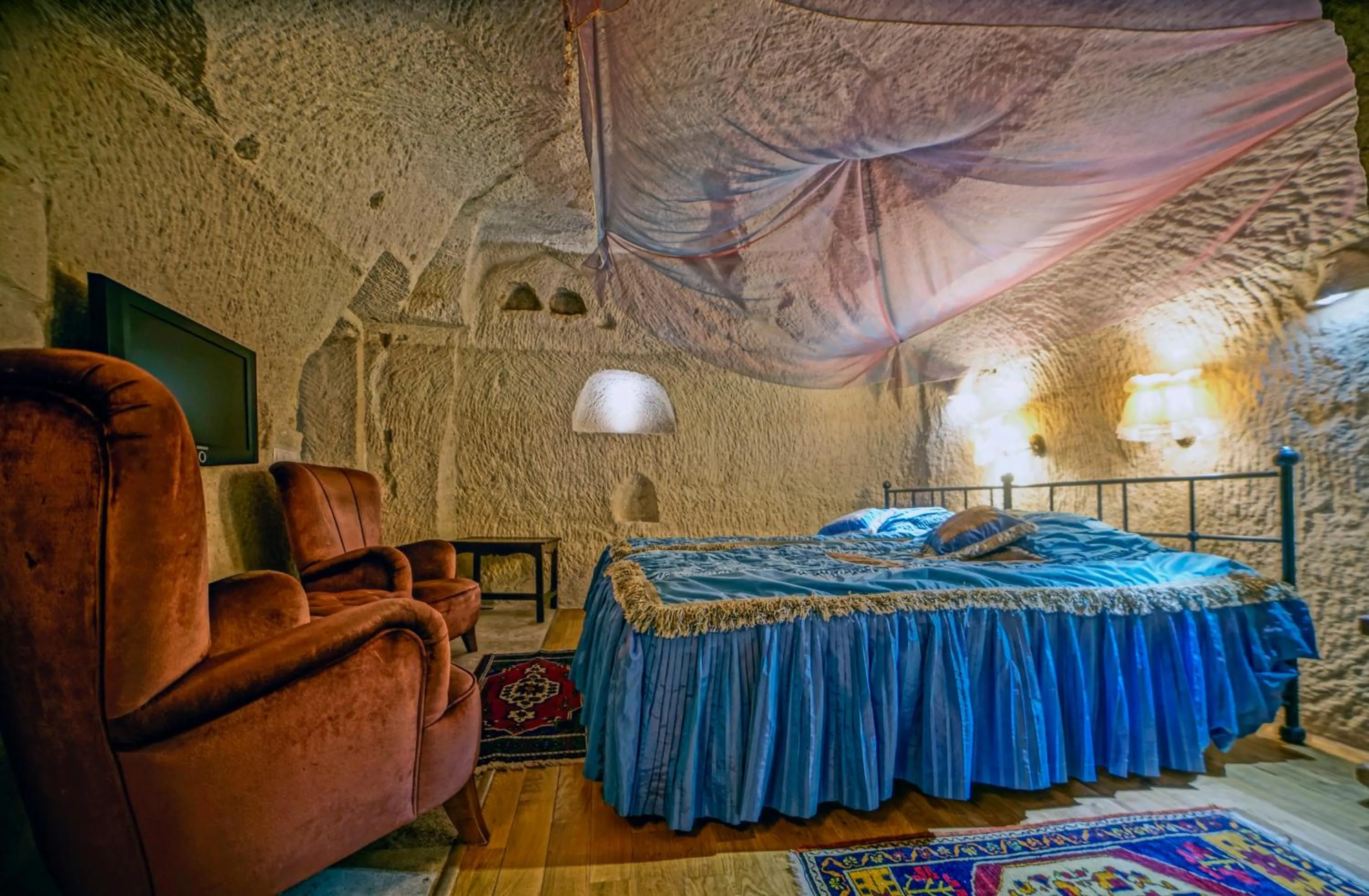 Bed in Anatolian Houses Cave Hotel & SPA