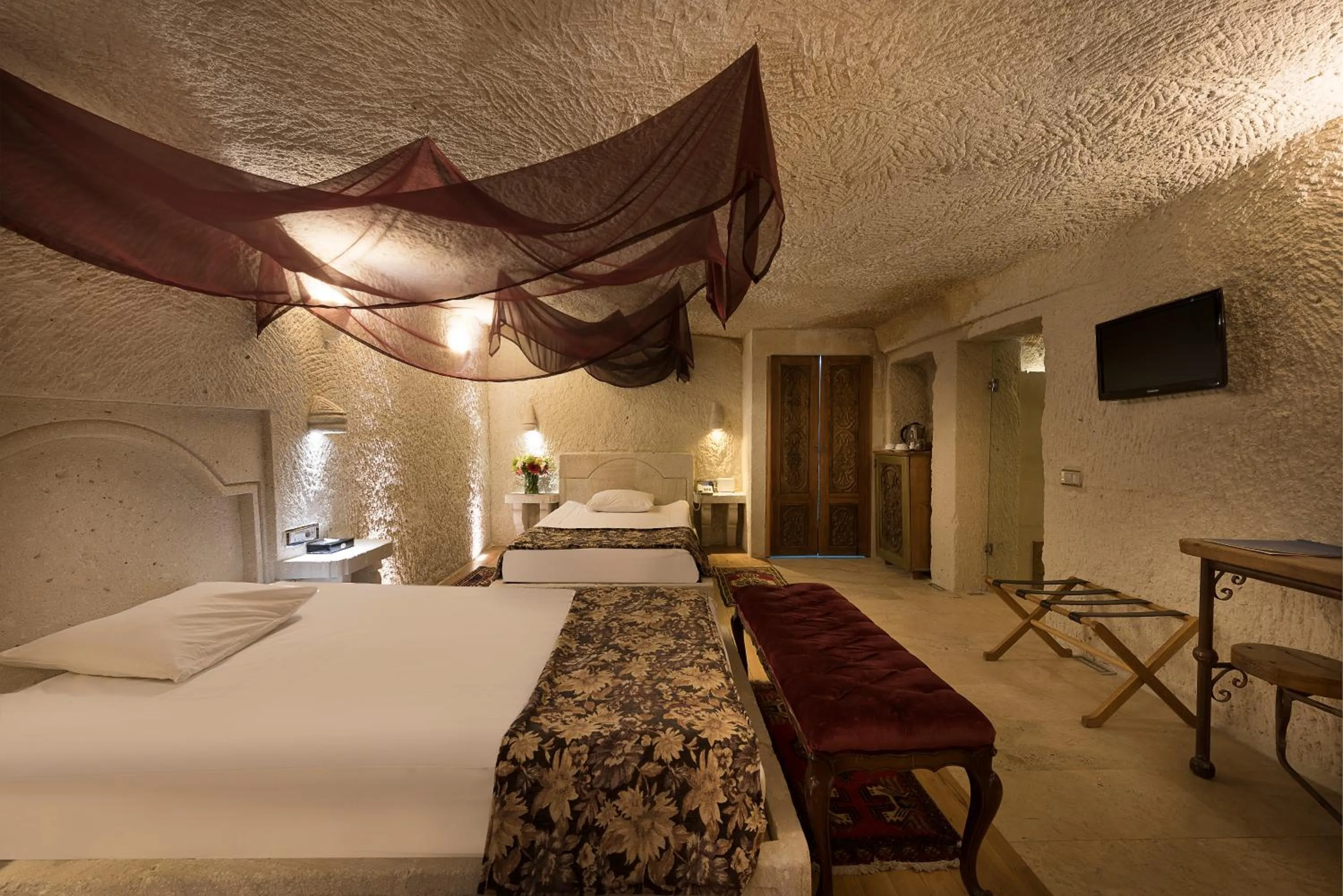 Bed in Anatolian Houses Cave Hotel & SPA