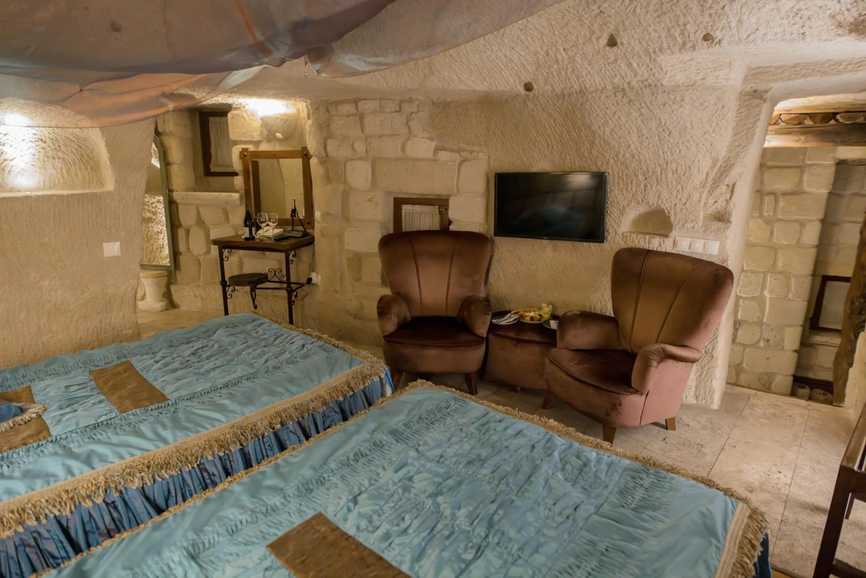 Seating area, Bed in Anatolian Houses Cave Hotel & SPA
