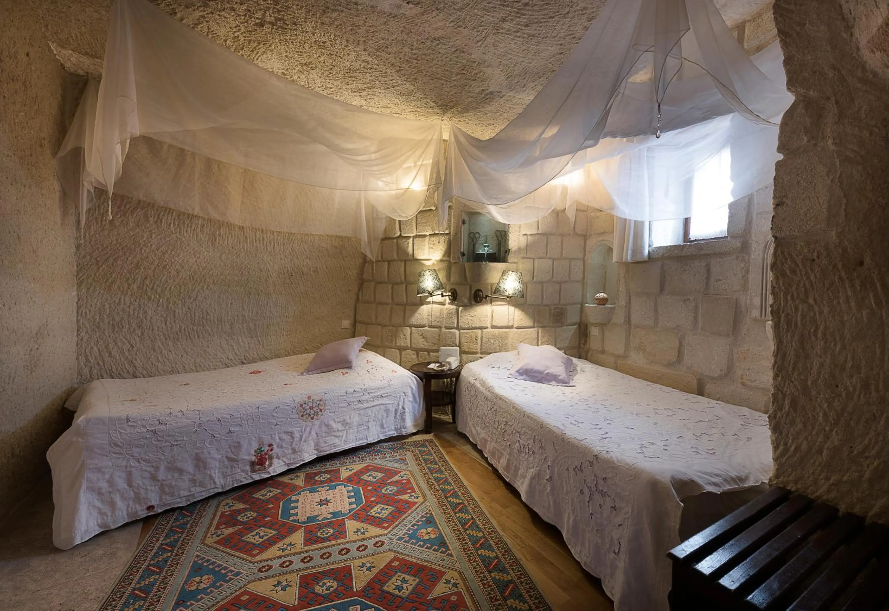 Bed in Anatolian Houses Cave Hotel & SPA