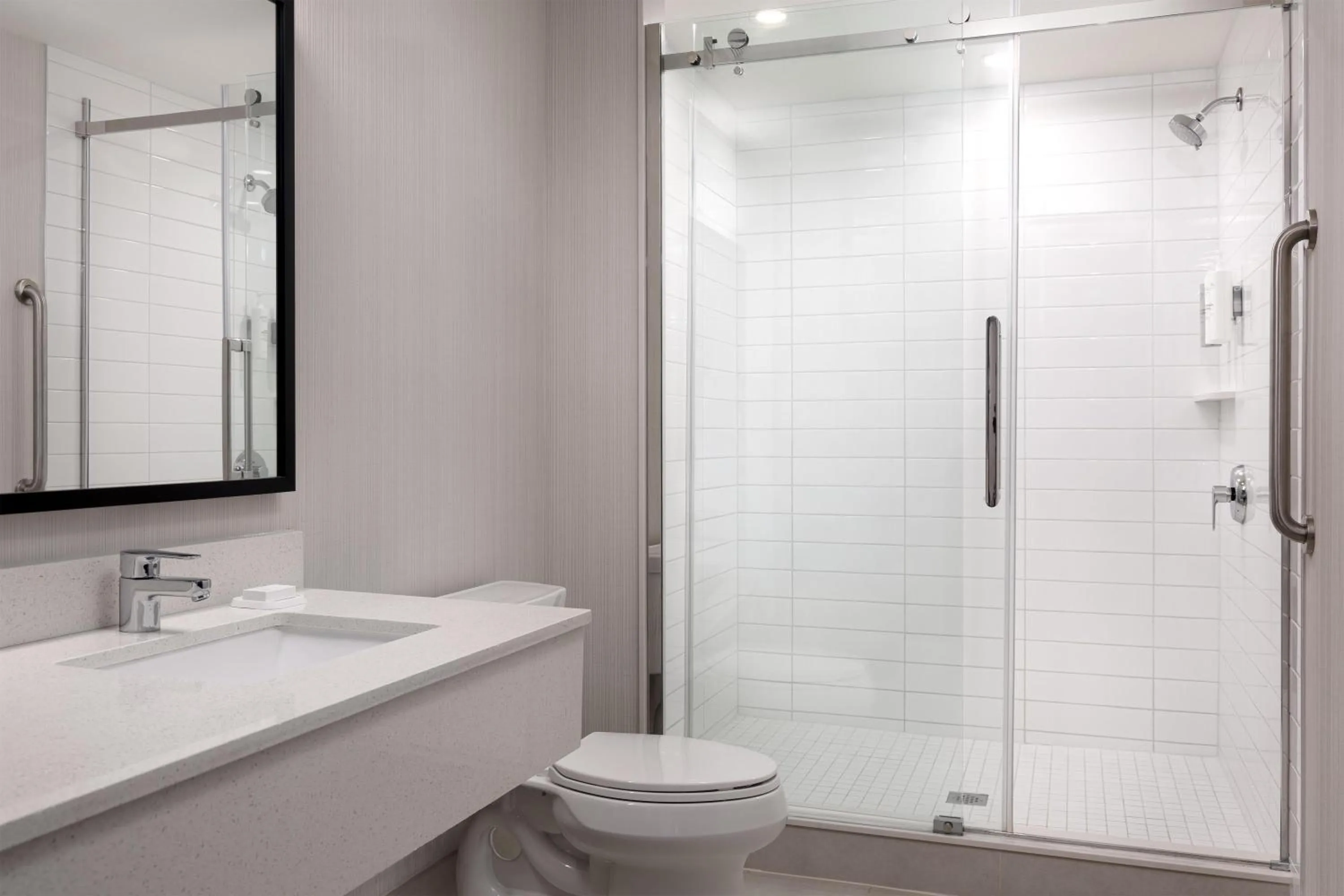 Bathroom in Spark by Hilton Toronto Mississauga