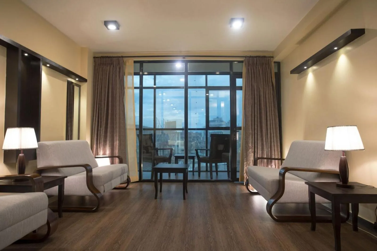 Living room, Bed in United Business Hotel