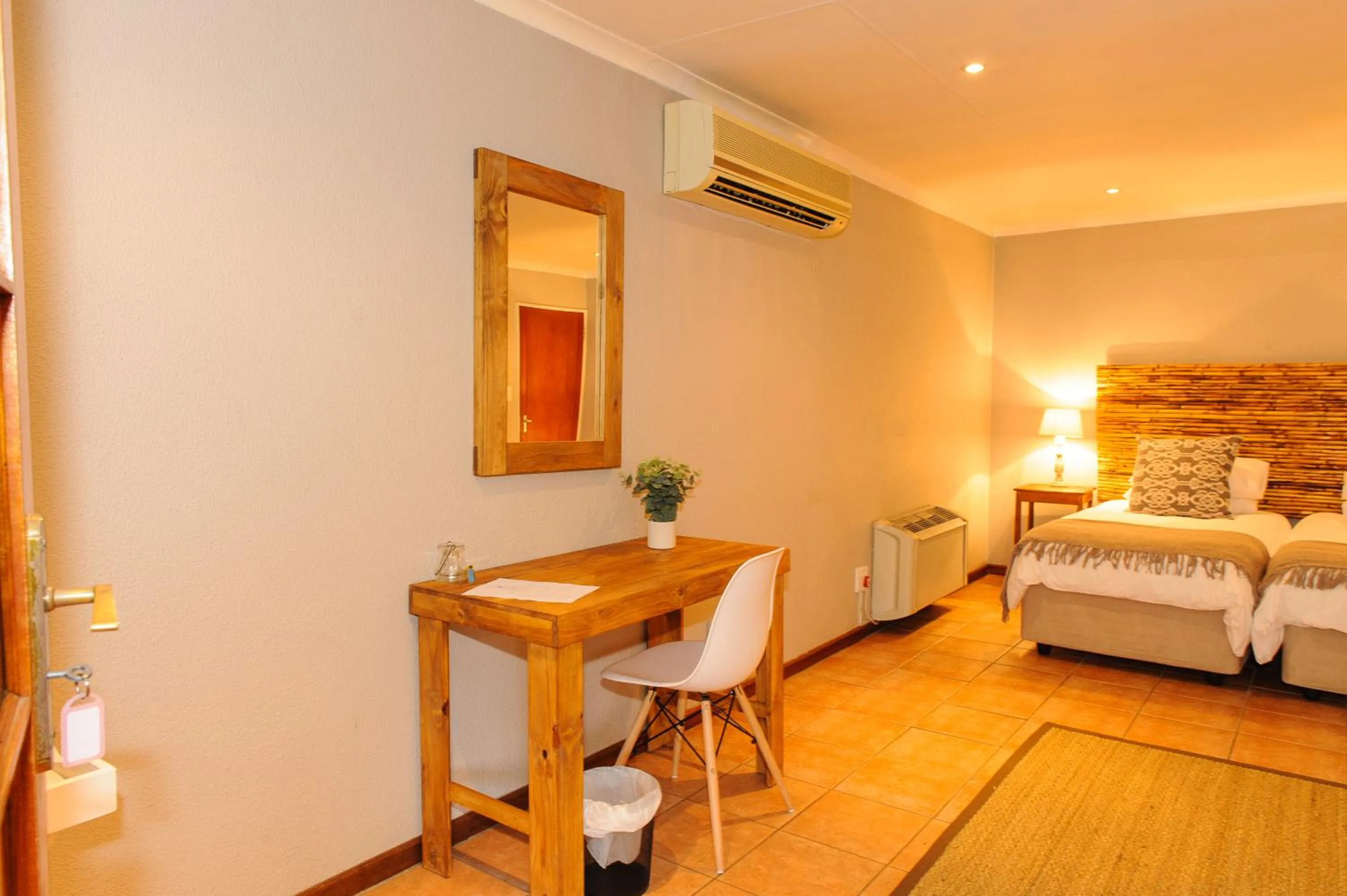 Bed in Safari Club Guest Lodge OR Tambo International Airport