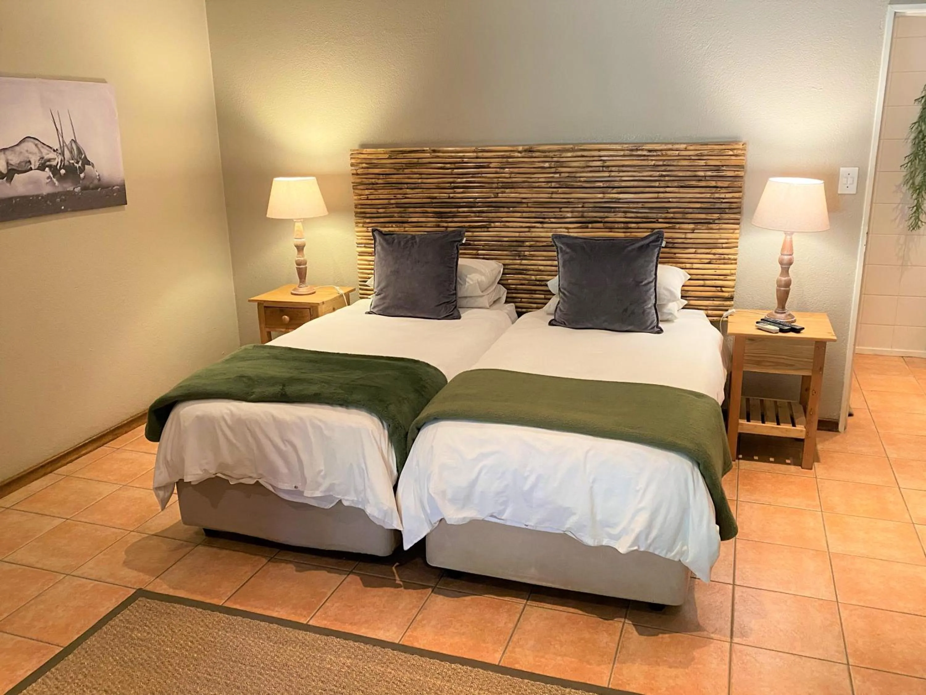 Bed in Safari Club Guest Lodge OR Tambo International Airport
