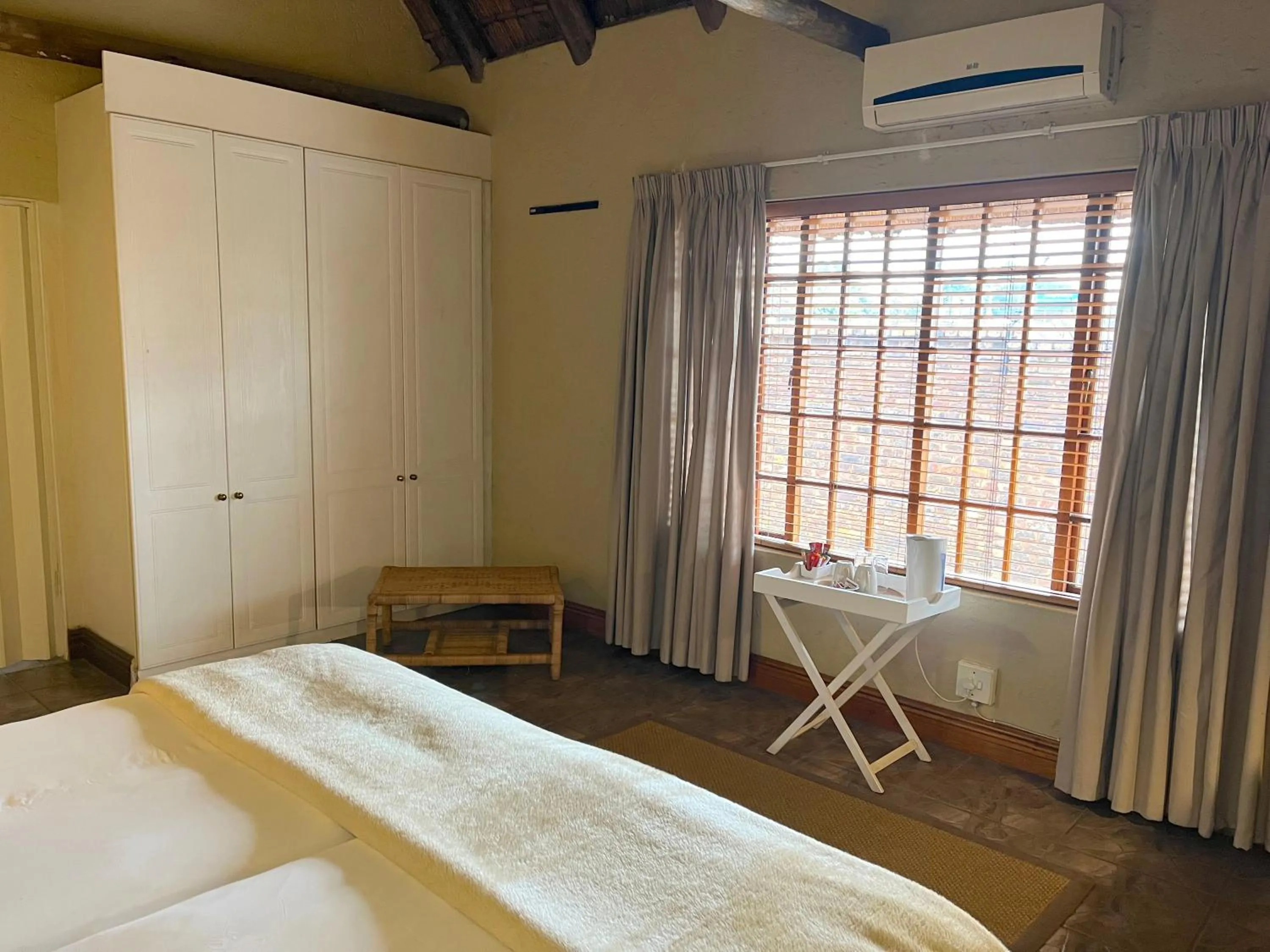 Bed in Safari Club Guest Lodge OR Tambo International Airport