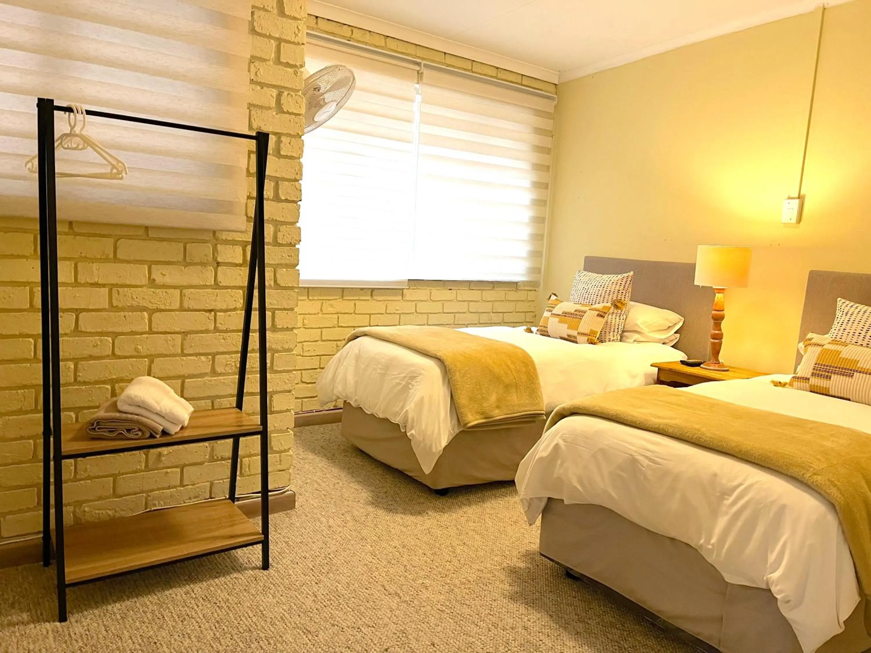 Photo of the whole room, Bed in Safari Club Guest Lodge OR Tambo International Airport