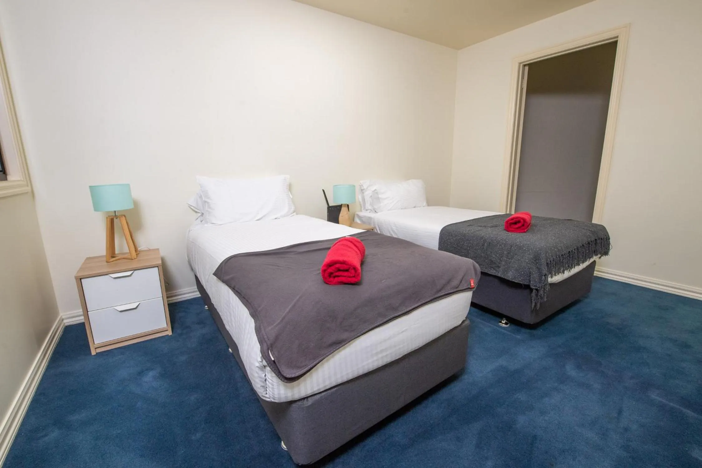 Bed in ReadySet Apartments on King