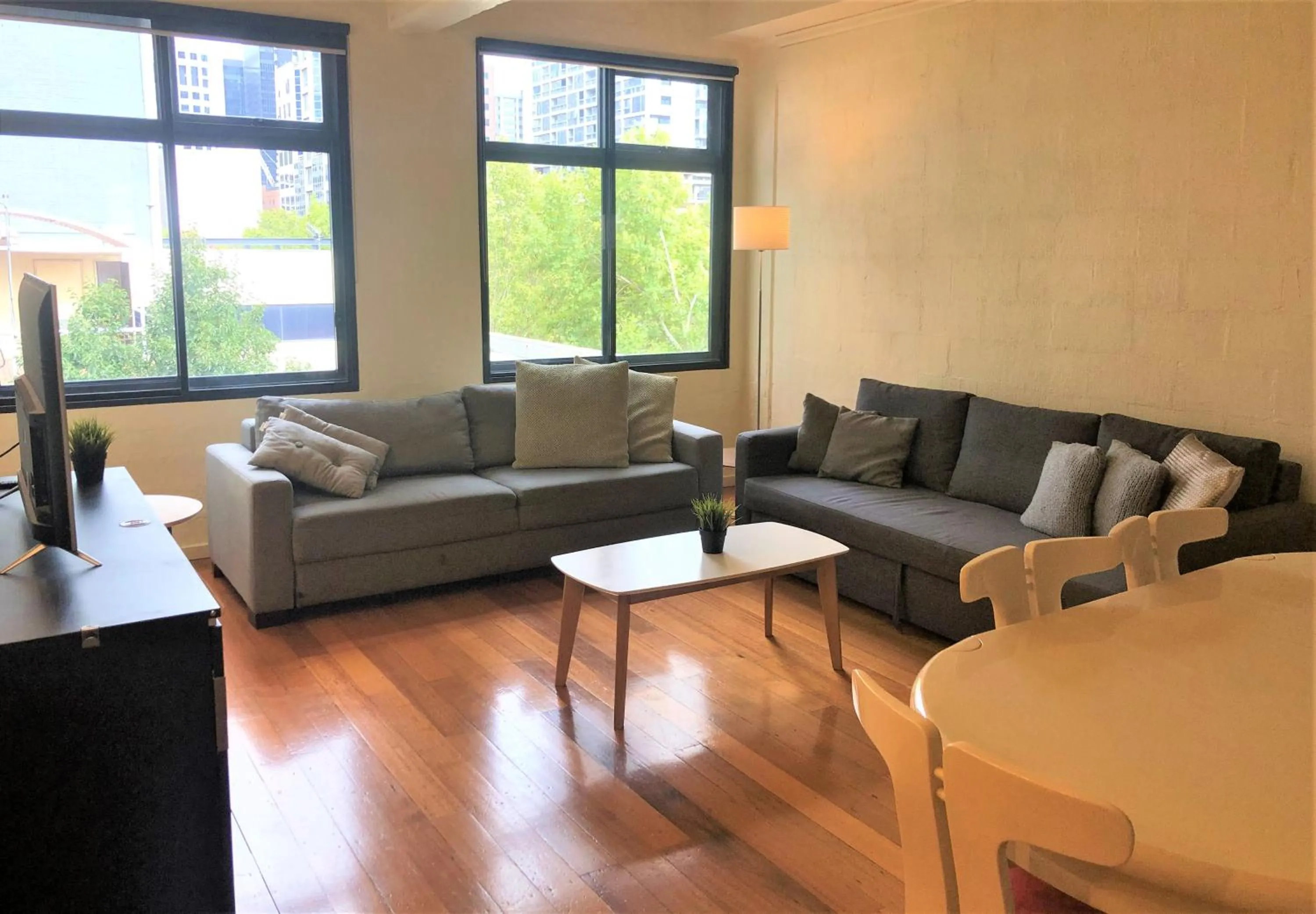 Living room in ReadySet Apartments on King