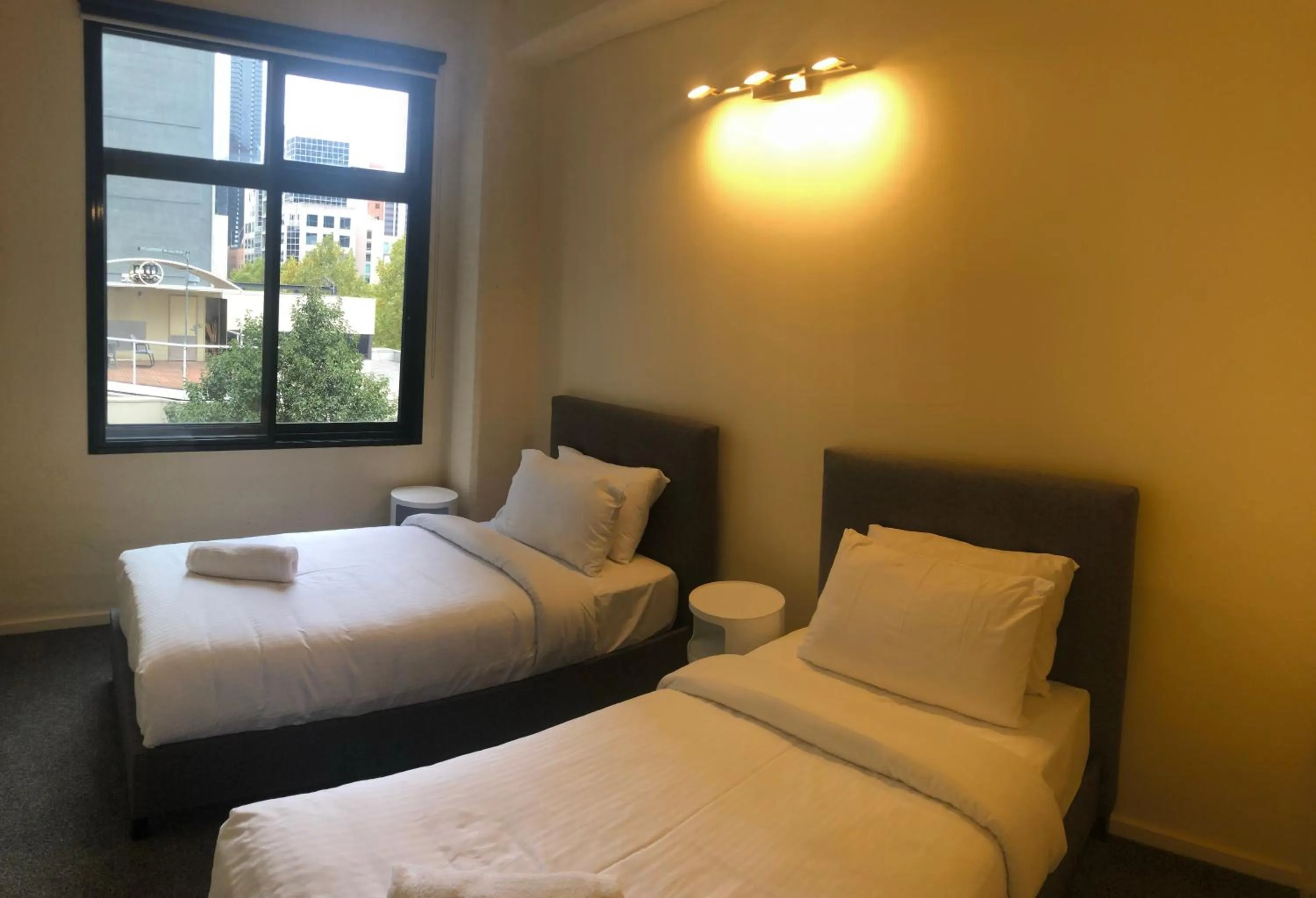 Bedroom, Bed in ReadySet Apartments on King