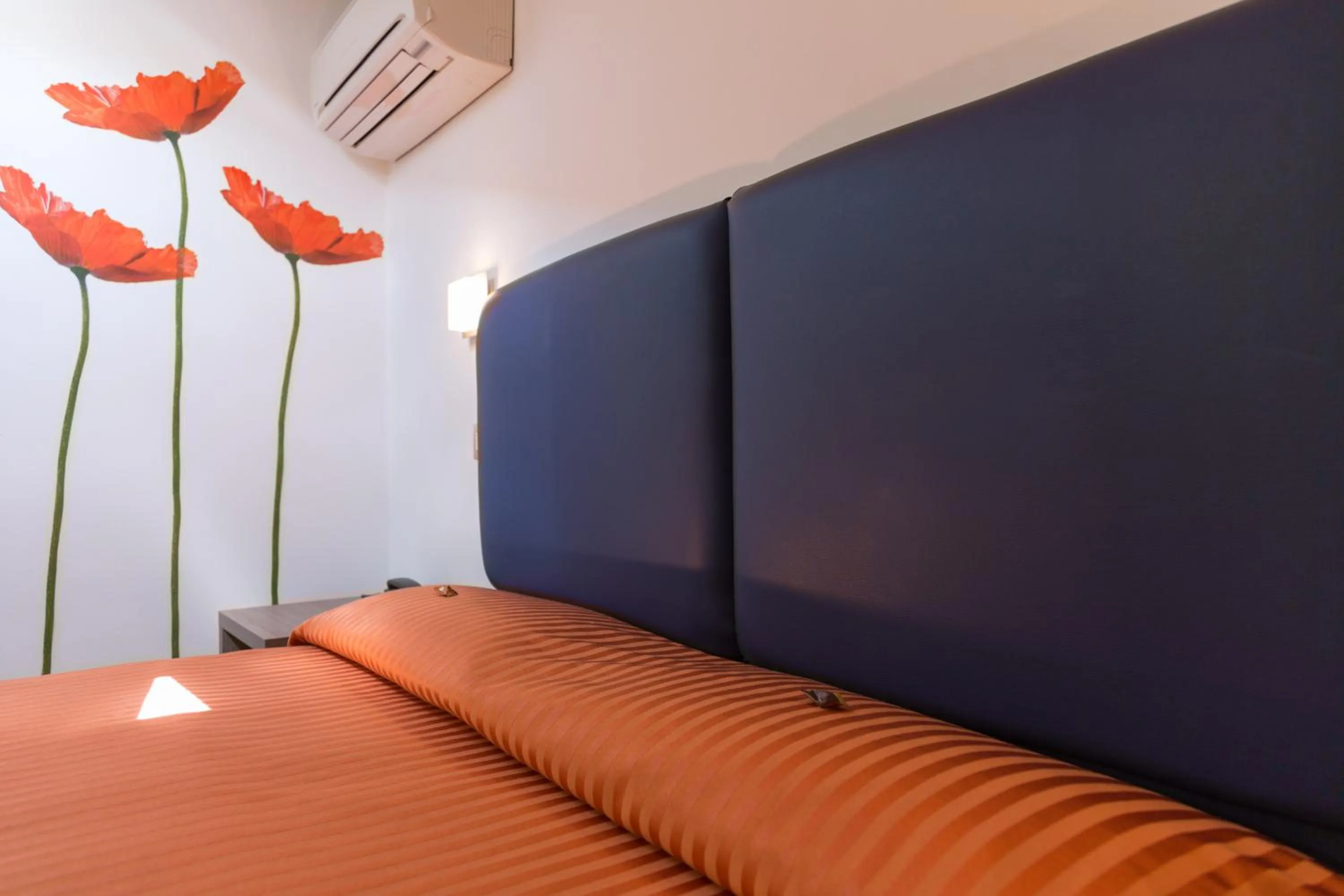 Bed in Hotel Miramare