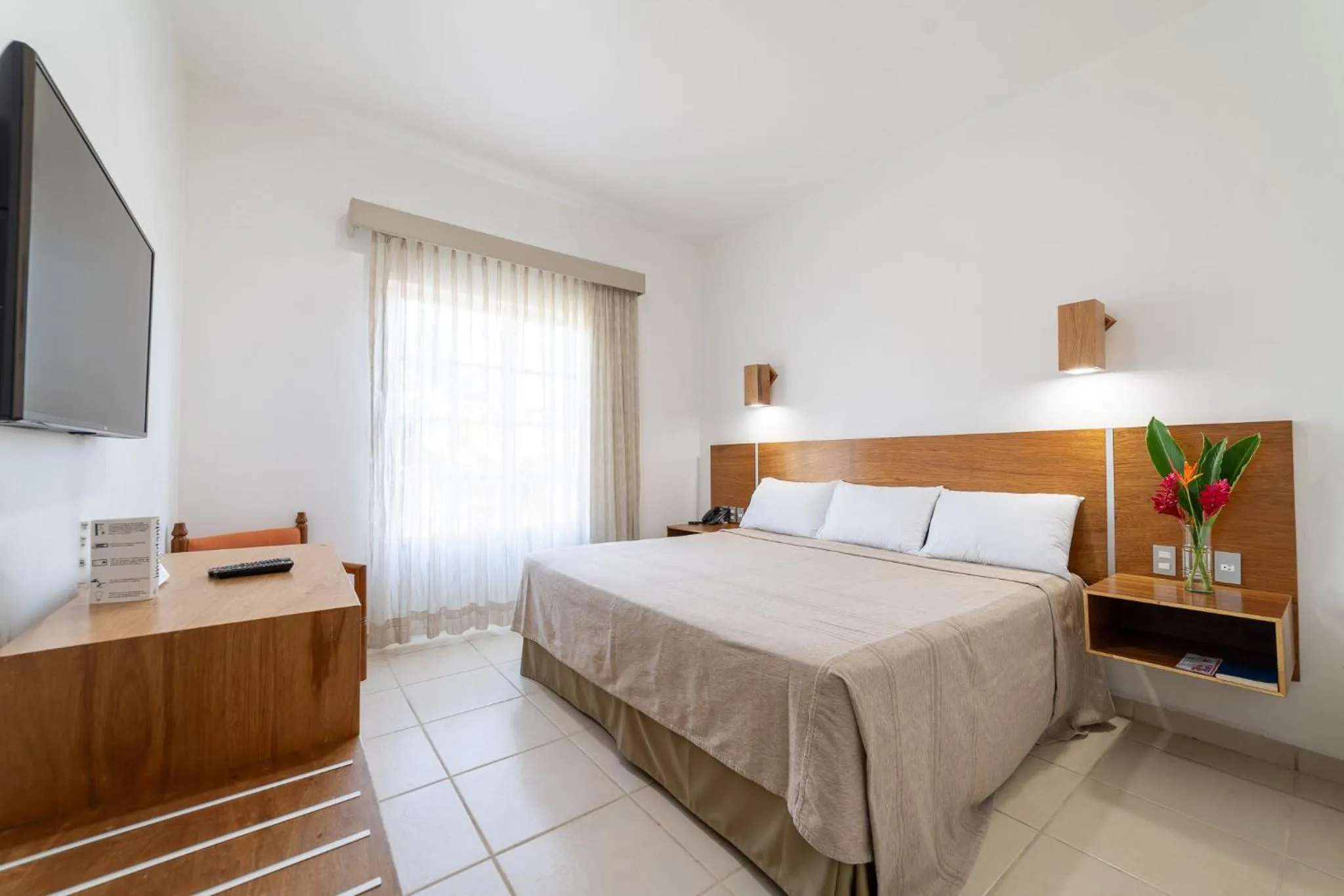 Photo of the whole room, Bed in Hotel Castillo Huatulco & Beach Club