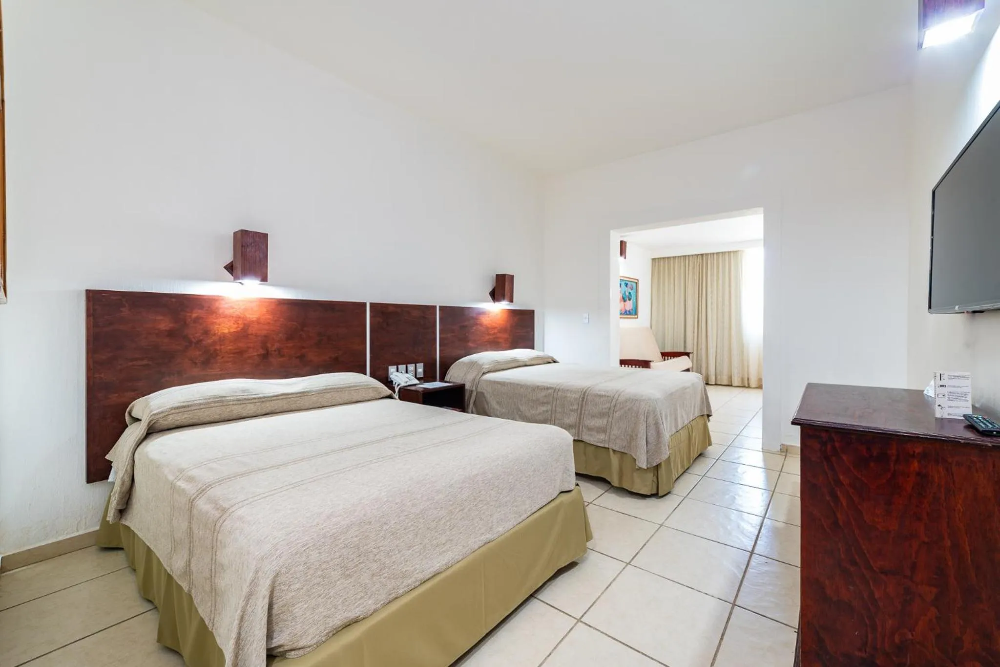 Bed in Hotel Castillo Huatulco & Beach Club