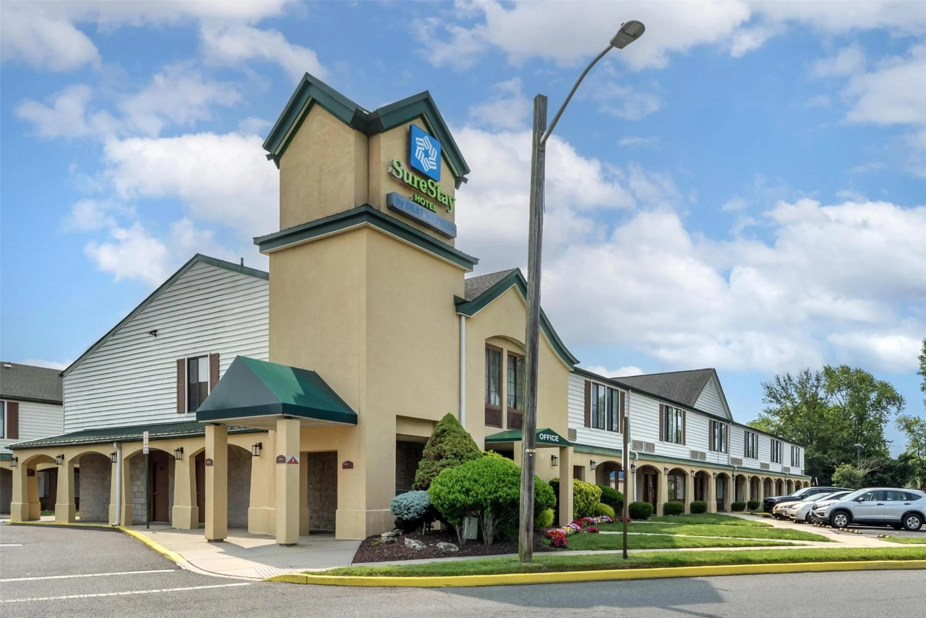 Property building in SureStay Hotel by Best Western East Brunswick