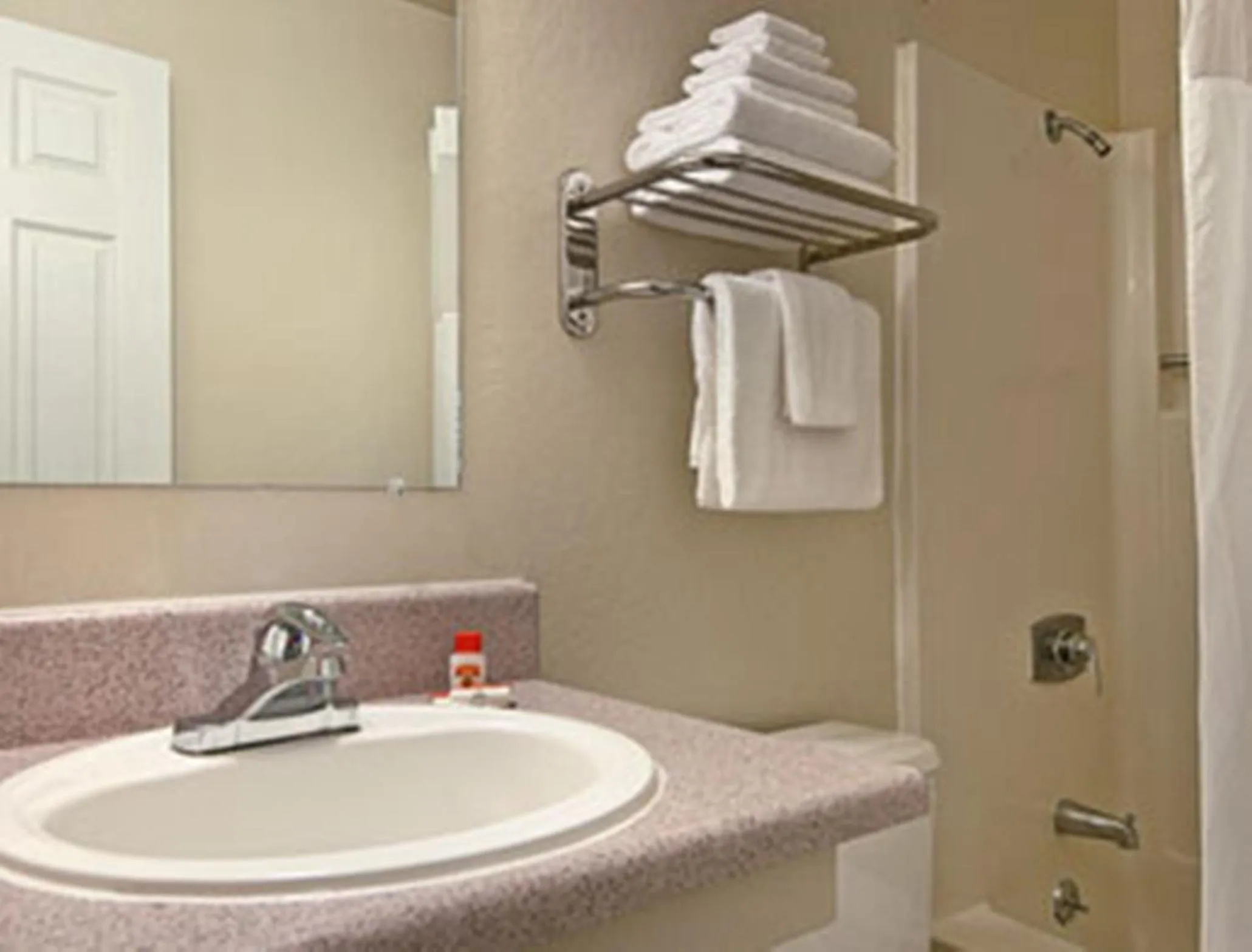 Bathroom in Super 8 by Wyndham Sacramento/Florin Rd