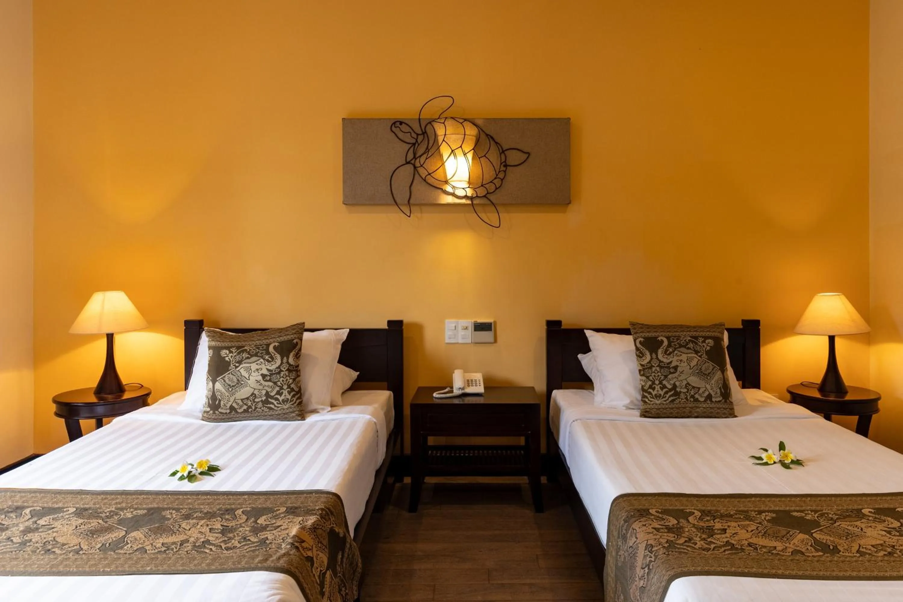 Bed in Seahorse Resort & Spa