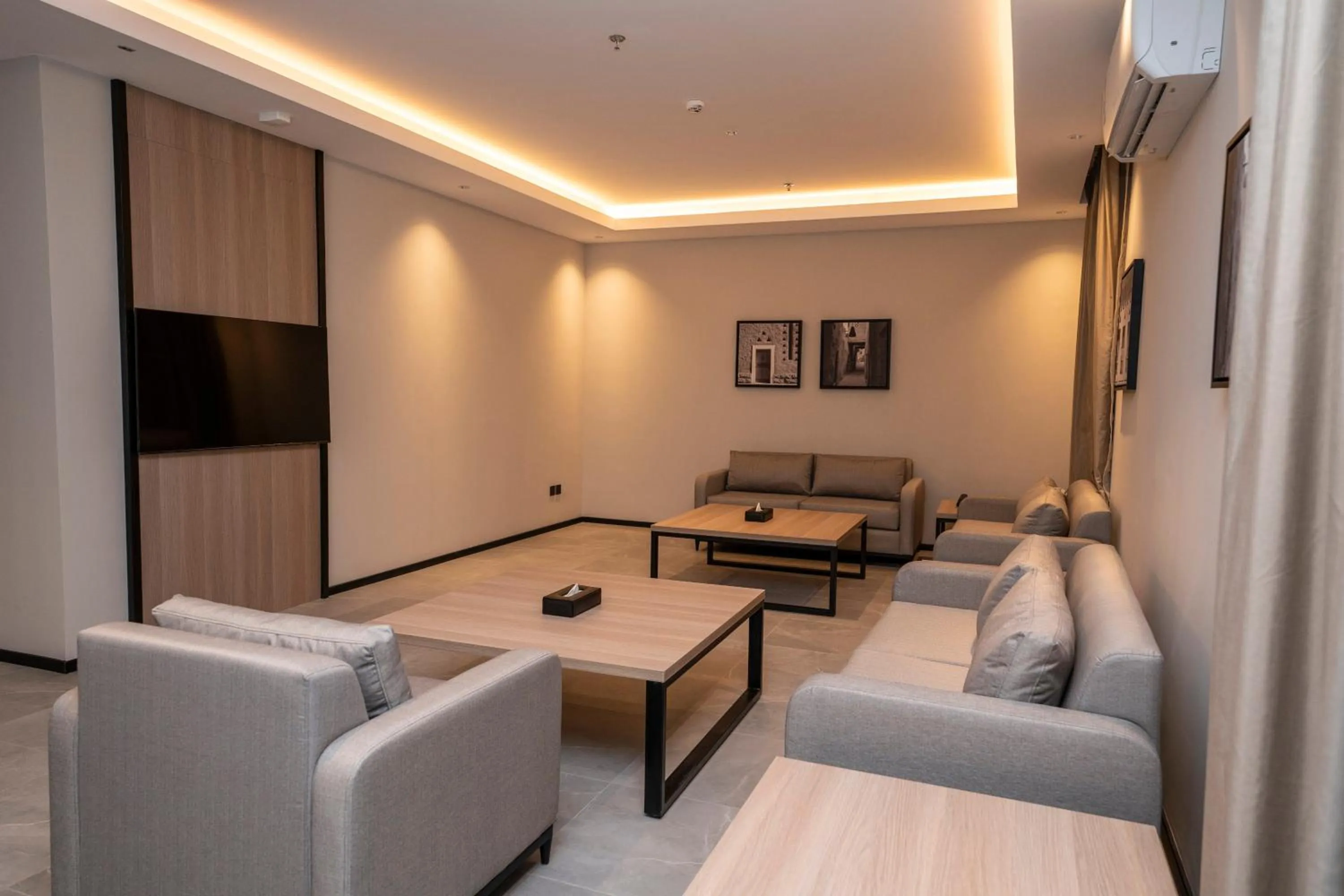 Living room in Manazel Aldiafah serviced Apartments AlSulymaniyah