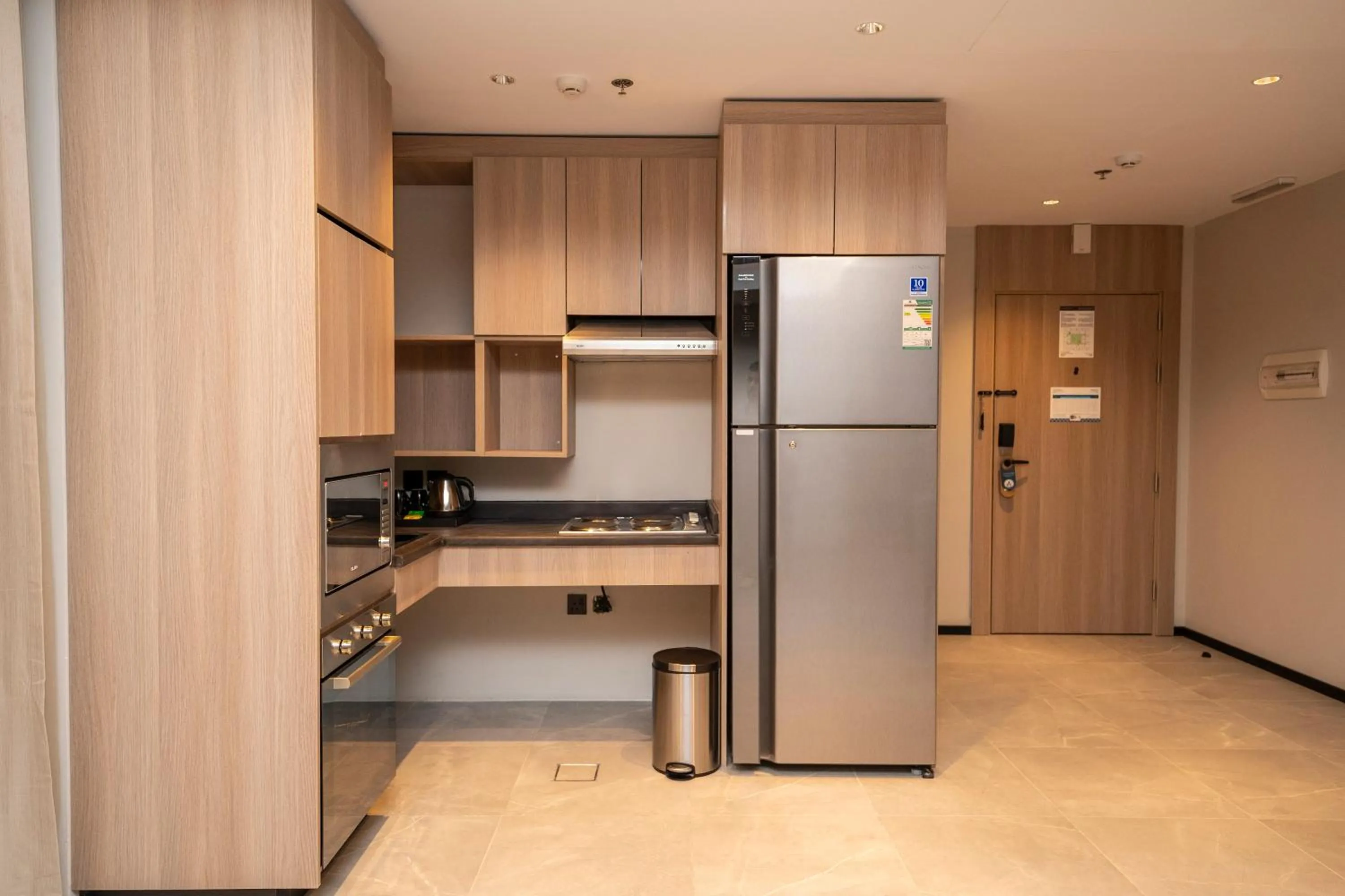 Kitchen or kitchenette in Manazel Aldiafah serviced Apartments AlSulymaniyah