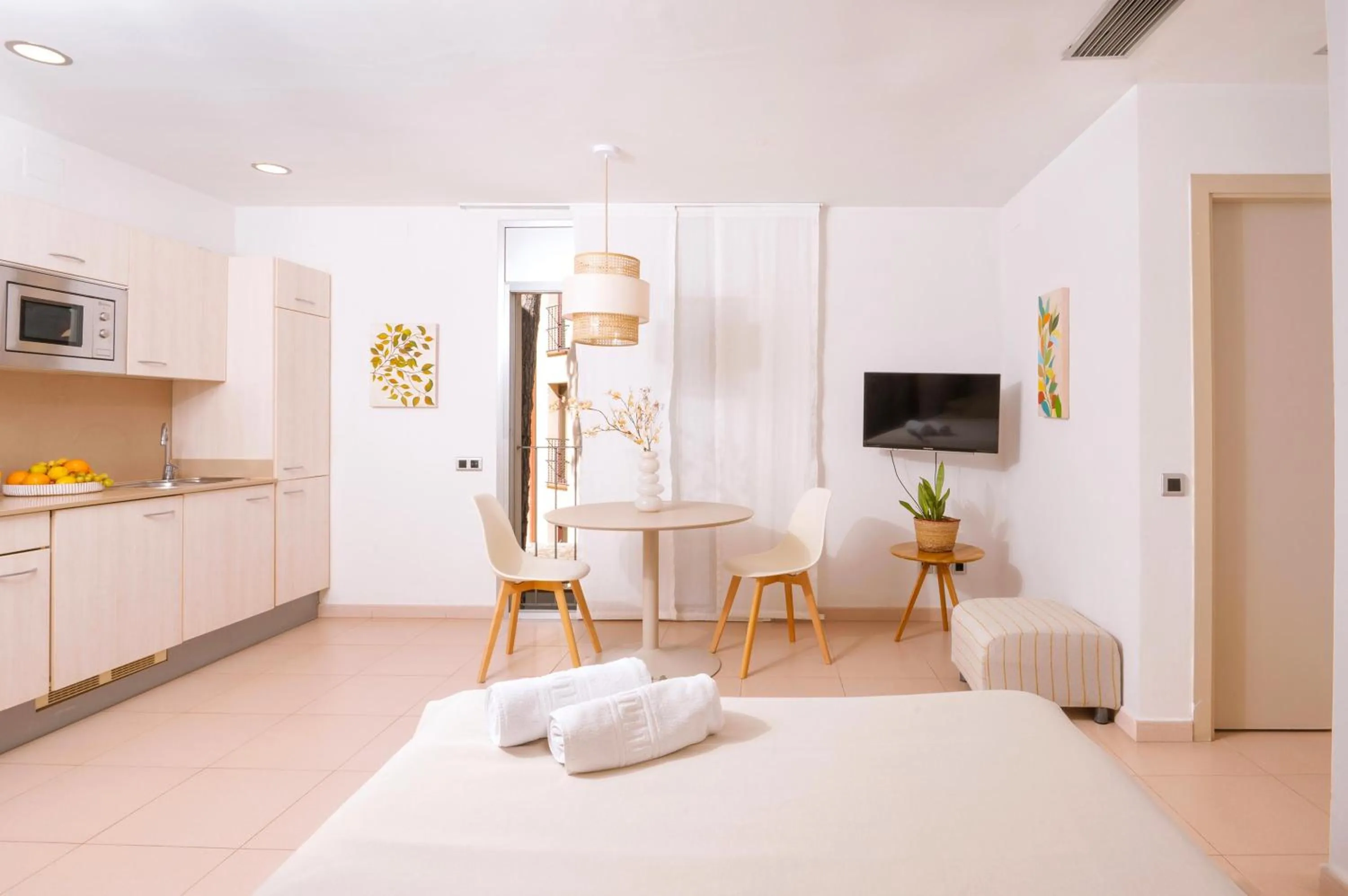 Bed in Apartamentos Porta Coeli