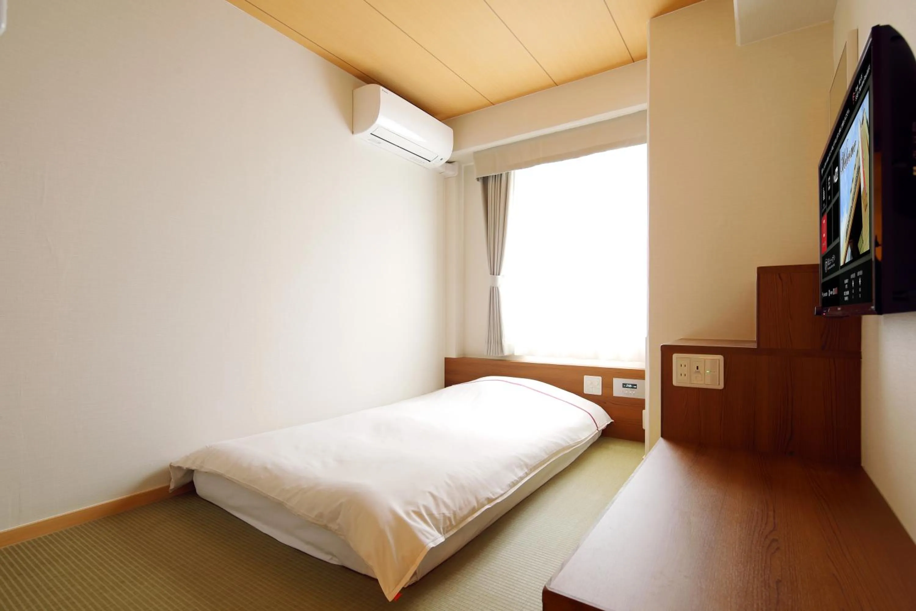 Bed in Okayama View Hotel
