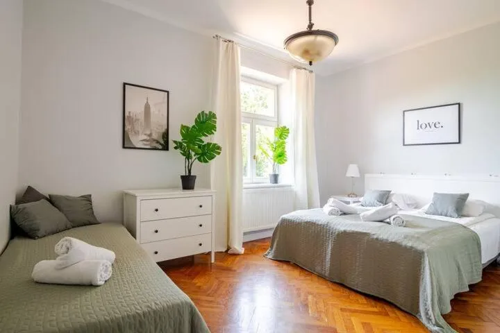 Bed in Florianska Gate Luxury Apartments