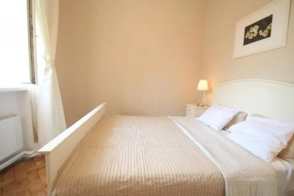Bed in Florianska Gate Luxury Apartments