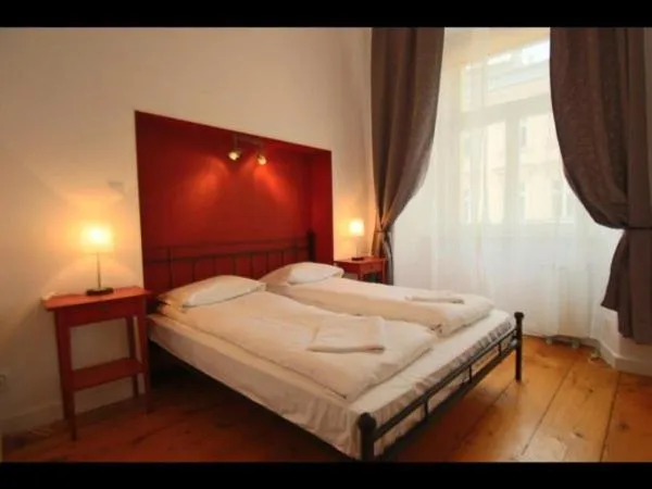 Bed in Florianska Gate Luxury Apartments