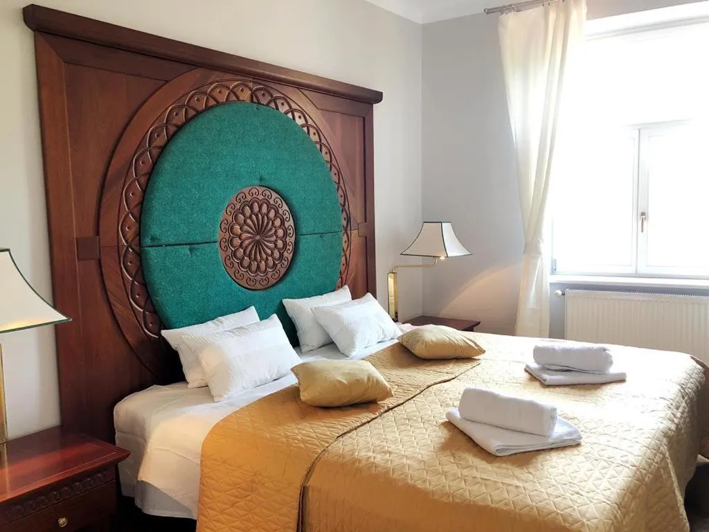 Bed in Florianska Gate Luxury Apartments