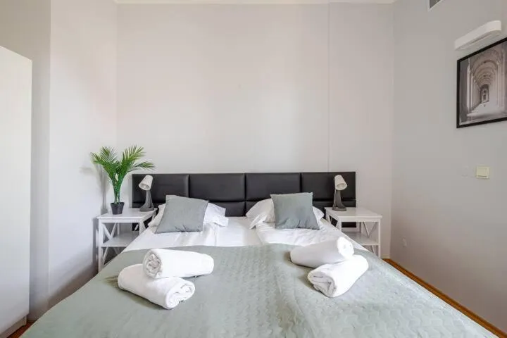 Bed in Florianska Gate Luxury Apartments