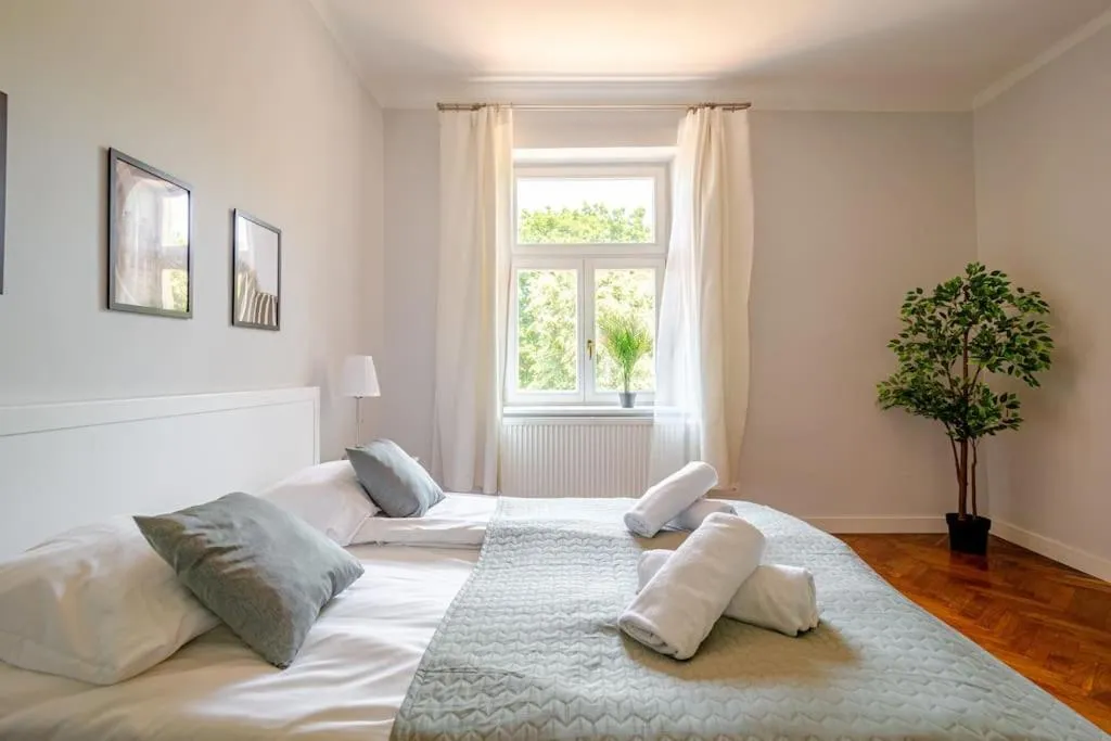 Bed in Florianska Gate Luxury Apartments