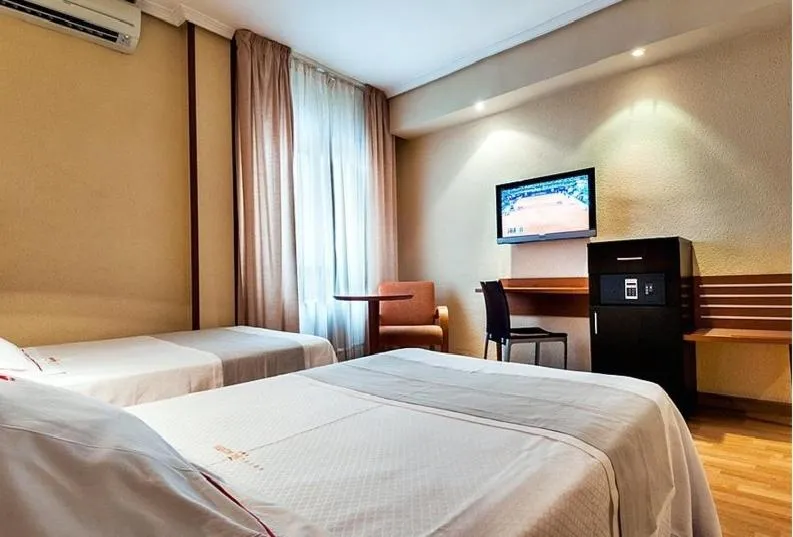 Decorative detail, Bed in HOTEL XAUEN en pleno centro con acceso autorizado y a 100m de la Catedral