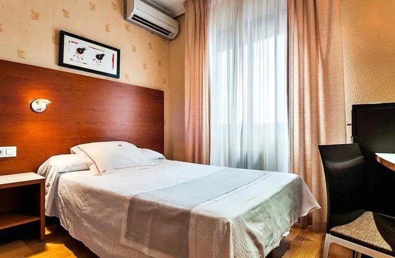 Bedroom, Bed in HOTEL XAUEN en pleno centro con acceso autorizado y a 100m de la Catedral