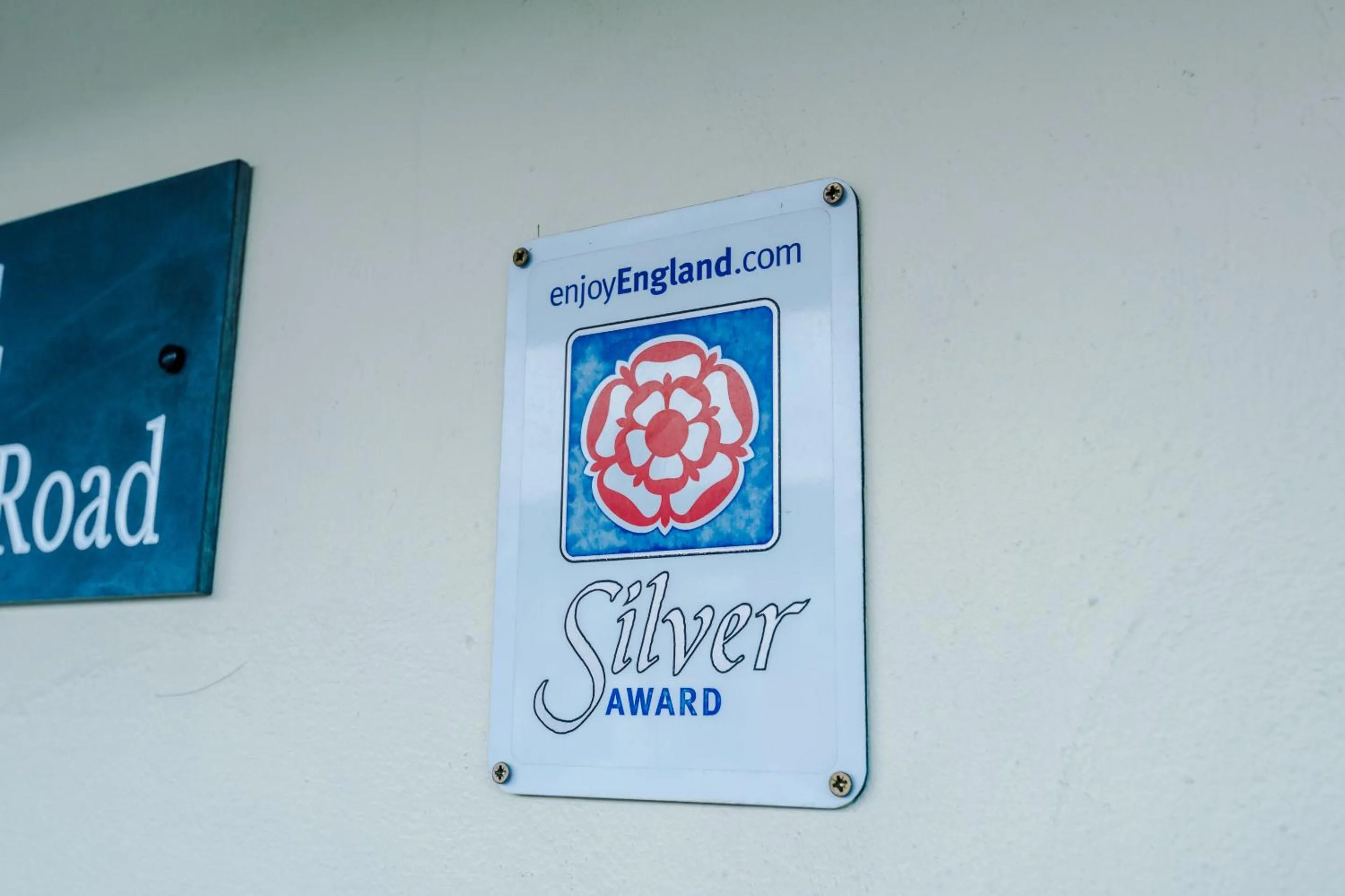 Property logo or sign in Holcombe Guest House