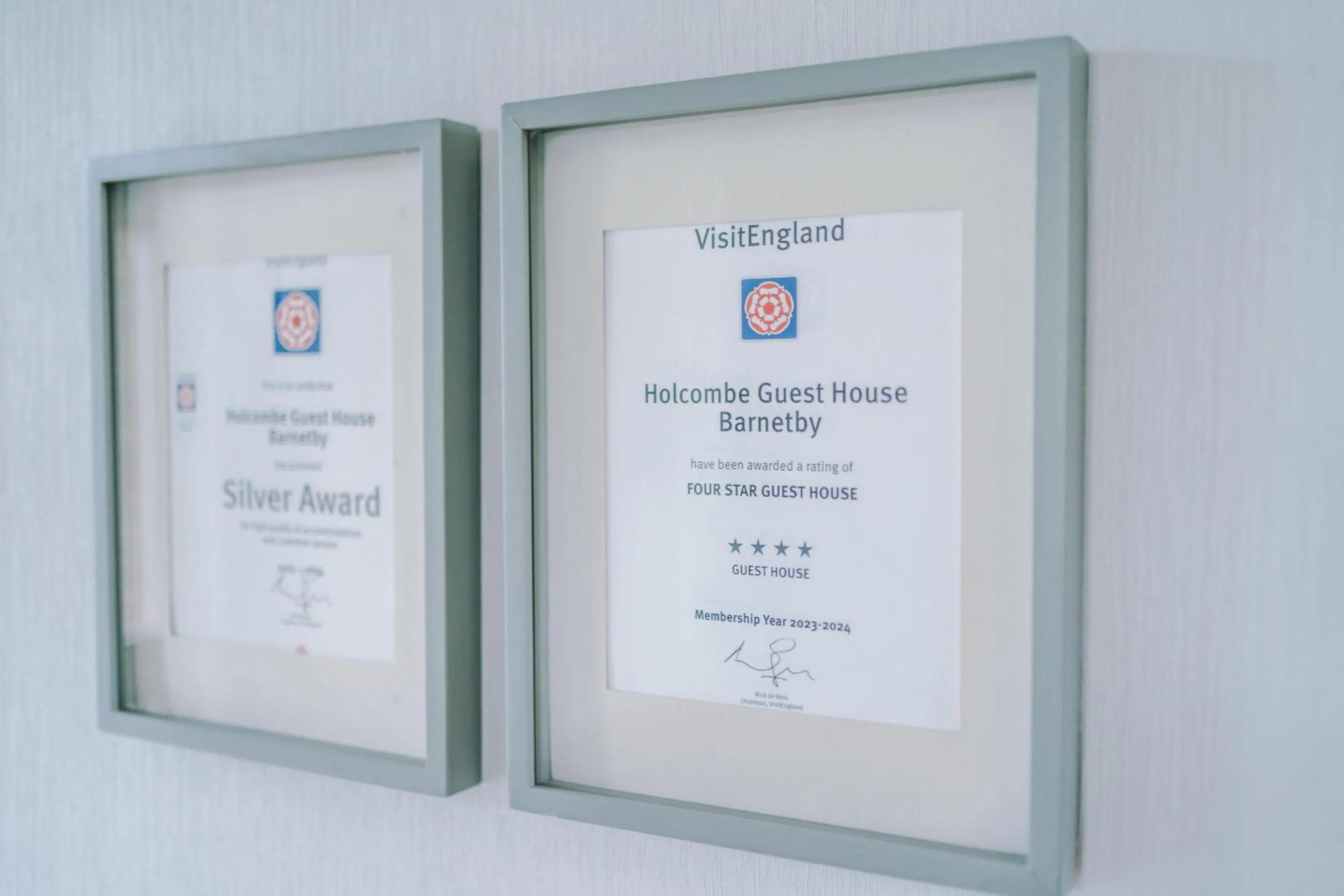 Property logo or sign in Holcombe Guest House