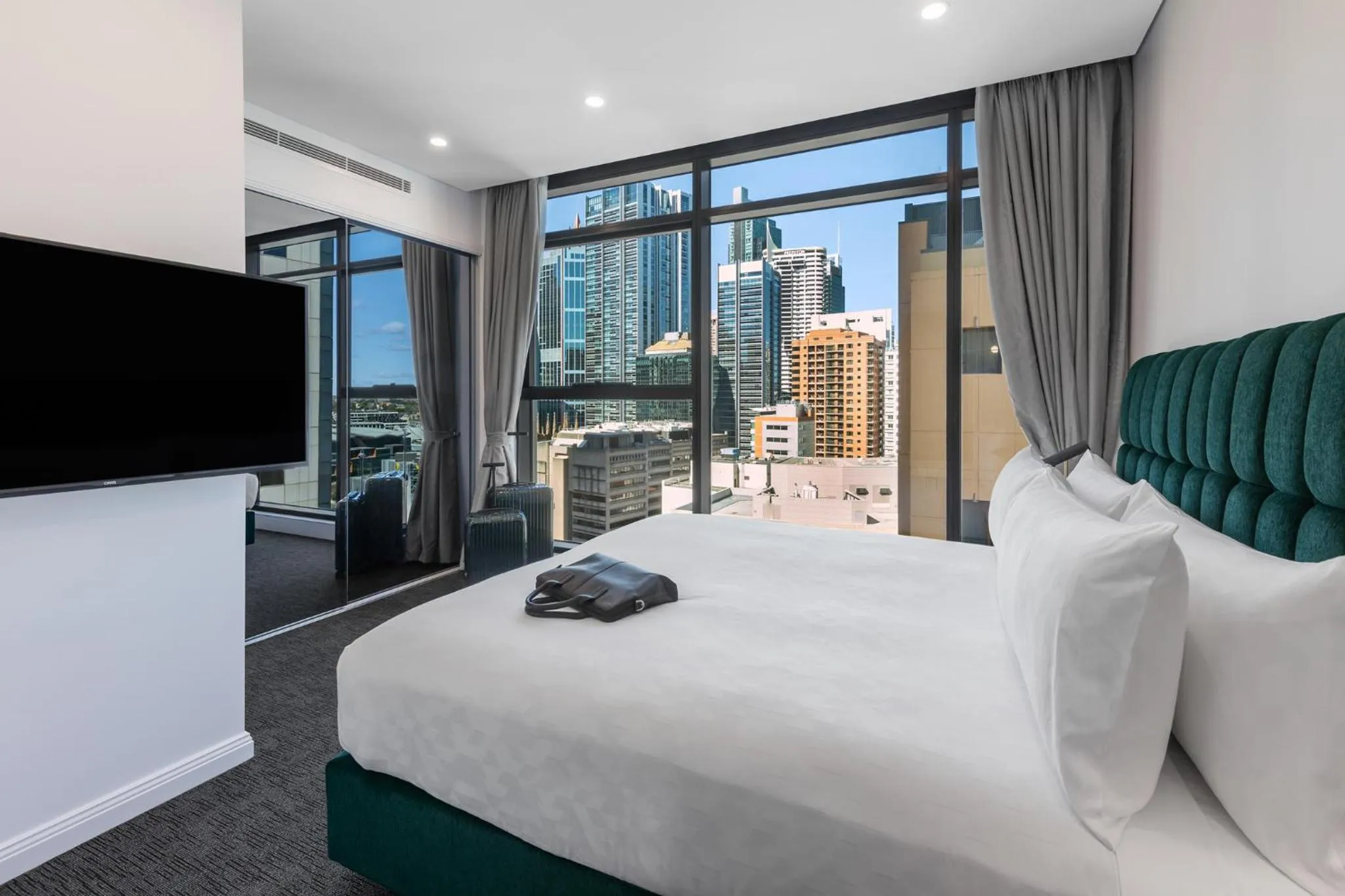 Bed in Meriton Suites Sussex Street, Sydney