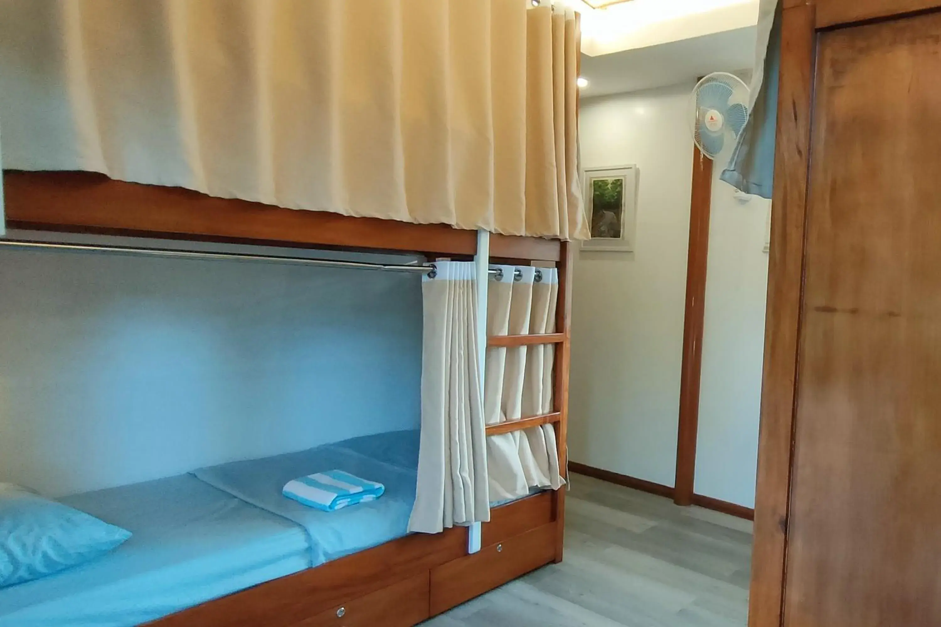 Bed in 4-Bed Male Dormitory Room in Intoy's Place Panglao near Beach Bed in 4-Bed Male Dormitory Room in Intoy's Place Panglao near Beach