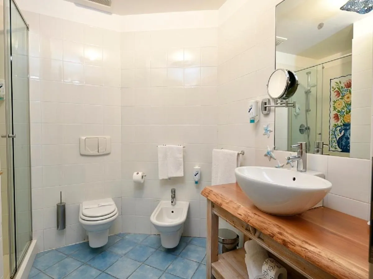 Bathroom in Hotel Resort & Spa Baia Caddinas