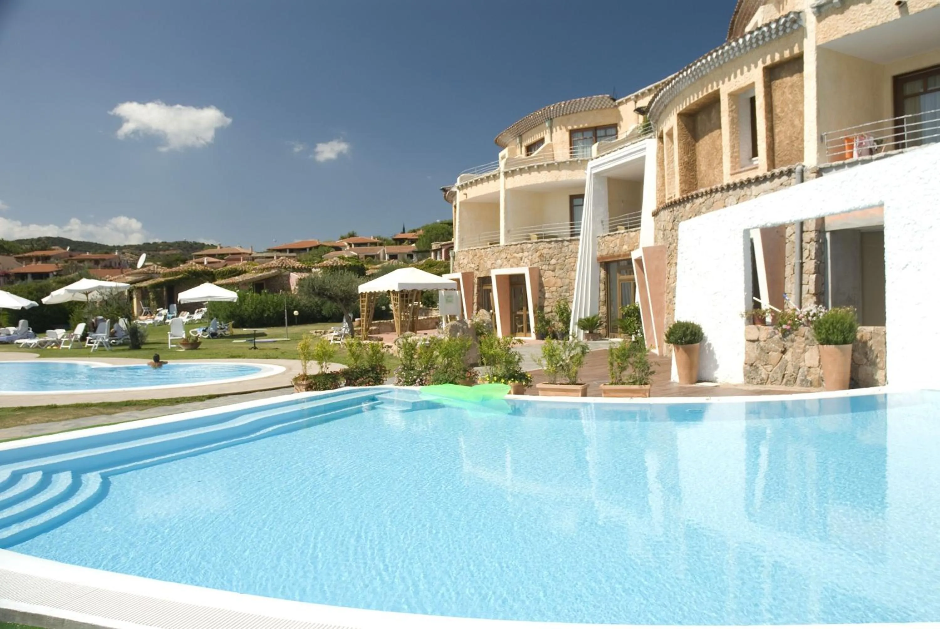 Swimming pool in Hotel Resort & Spa Baia Caddinas