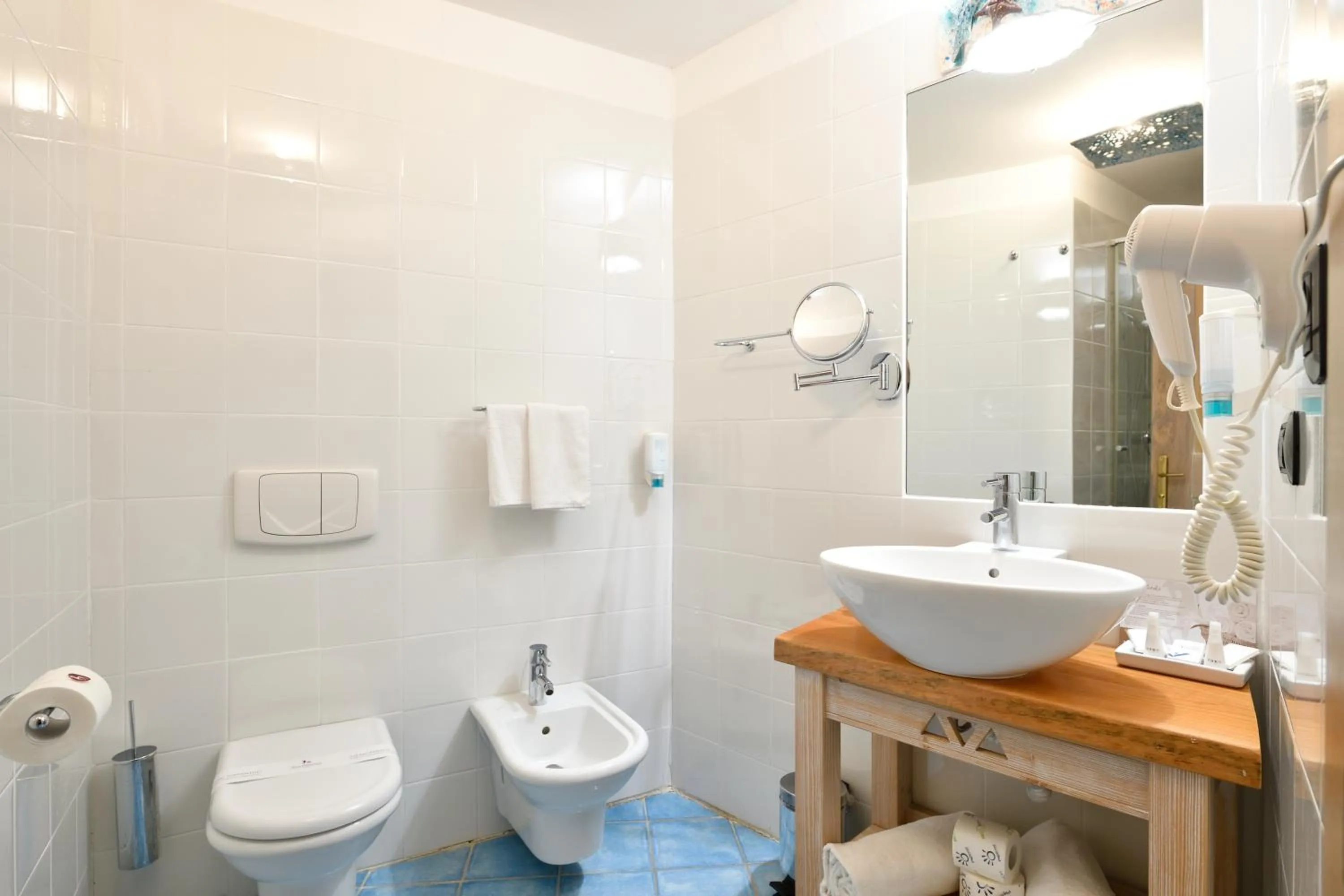 Bathroom in Hotel Resort & Spa Baia Caddinas