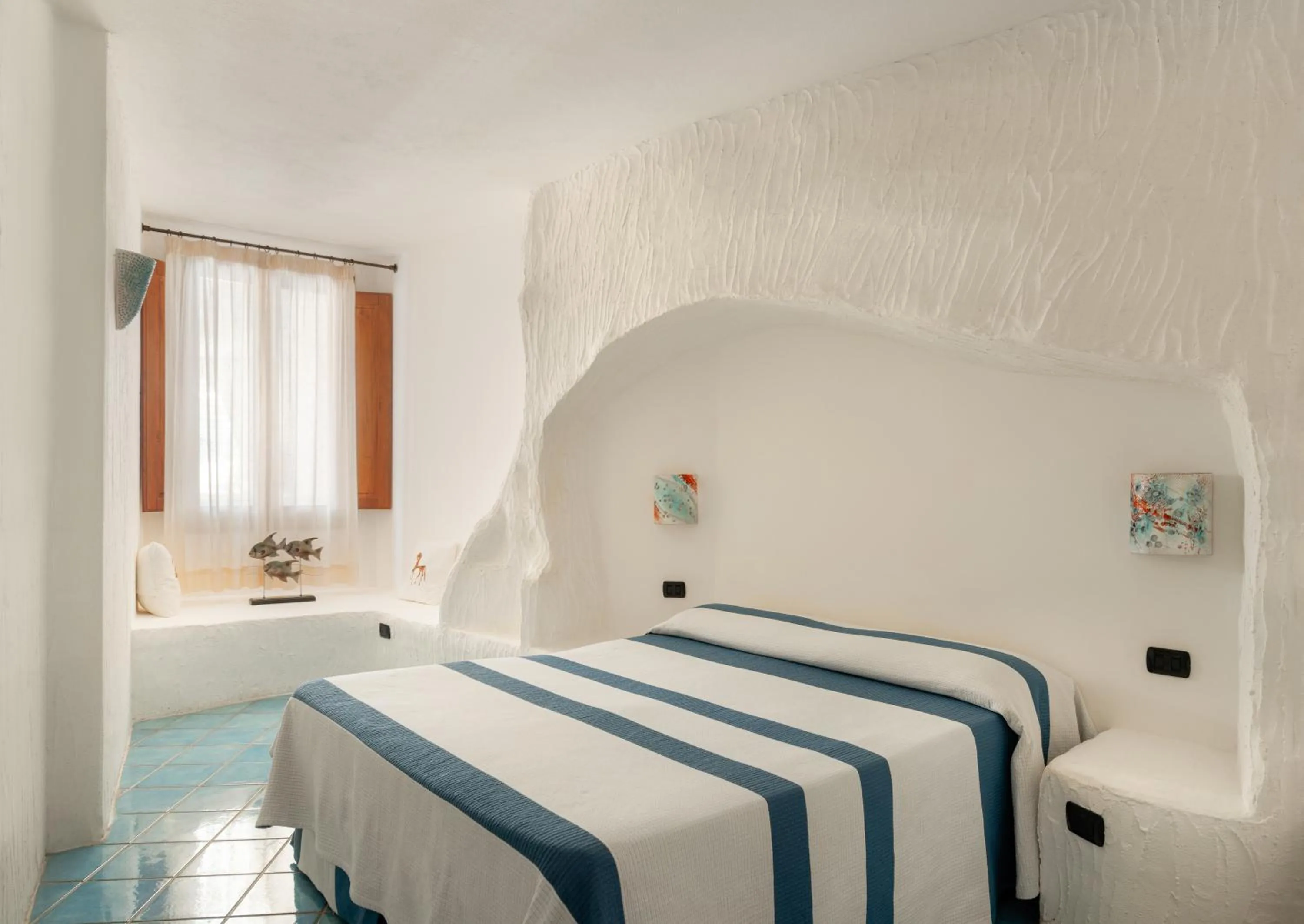 Bed in Hotel Resort & Spa Baia Caddinas