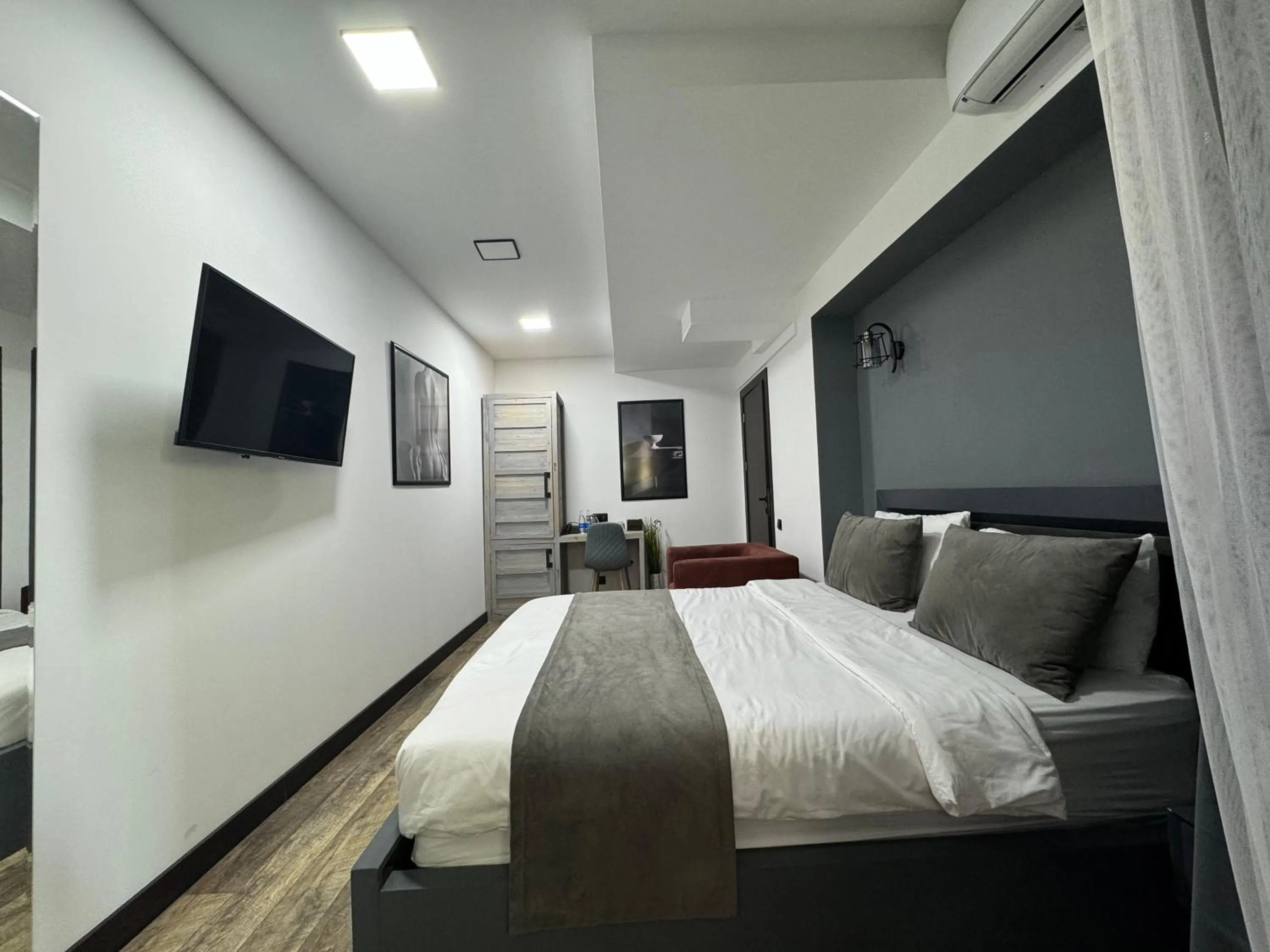 Bed in The Phoenix Boutique Hotel