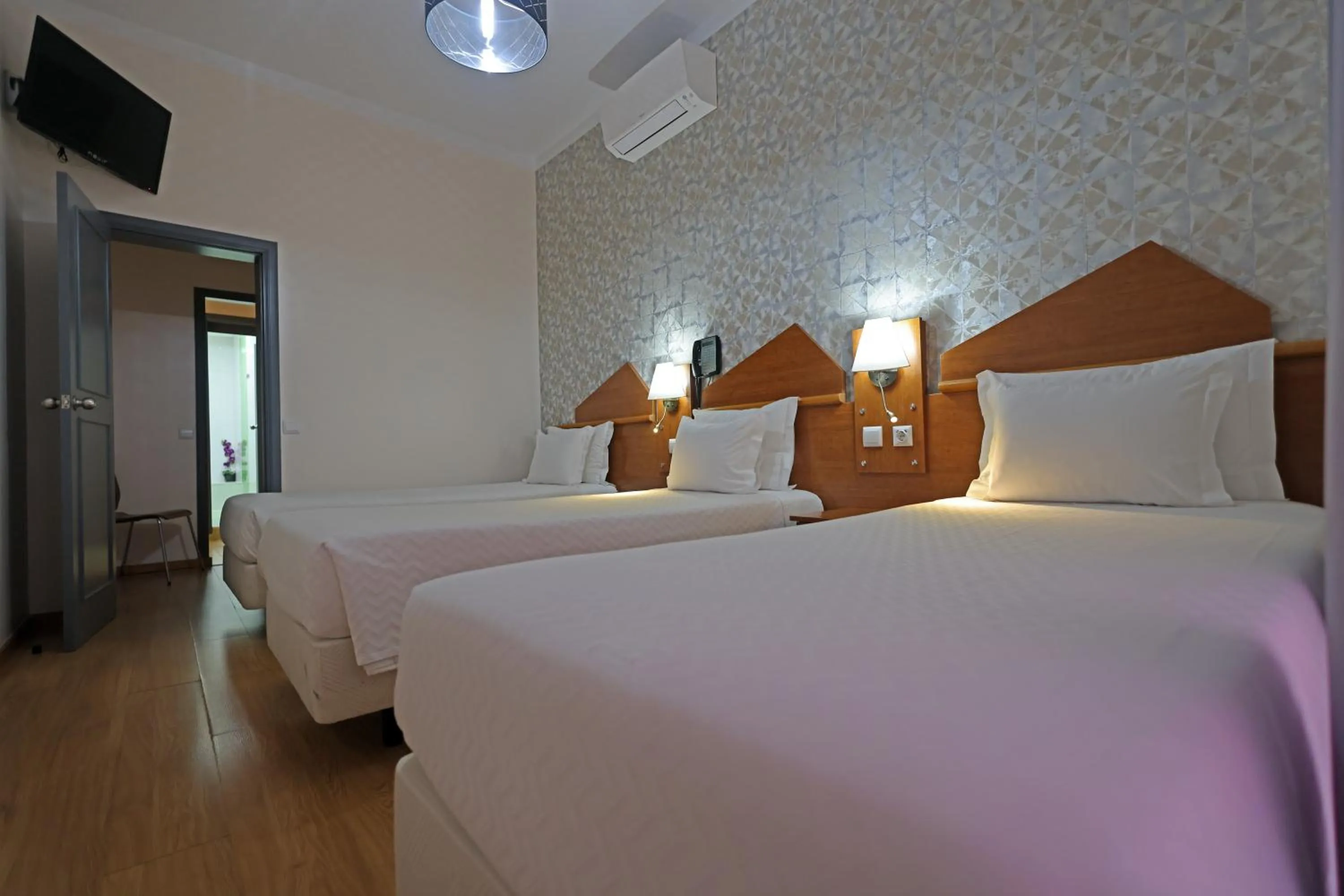 Bed in Pensao Praca Da Figueira