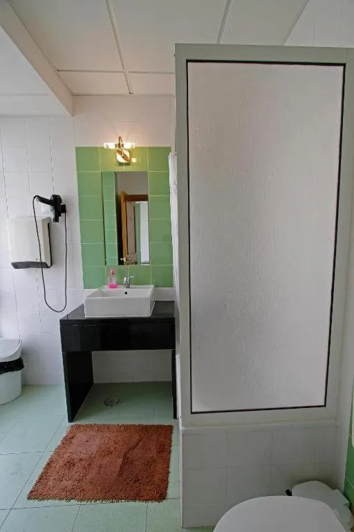Bathroom, Bed in Pensao Praca Da Figueira
