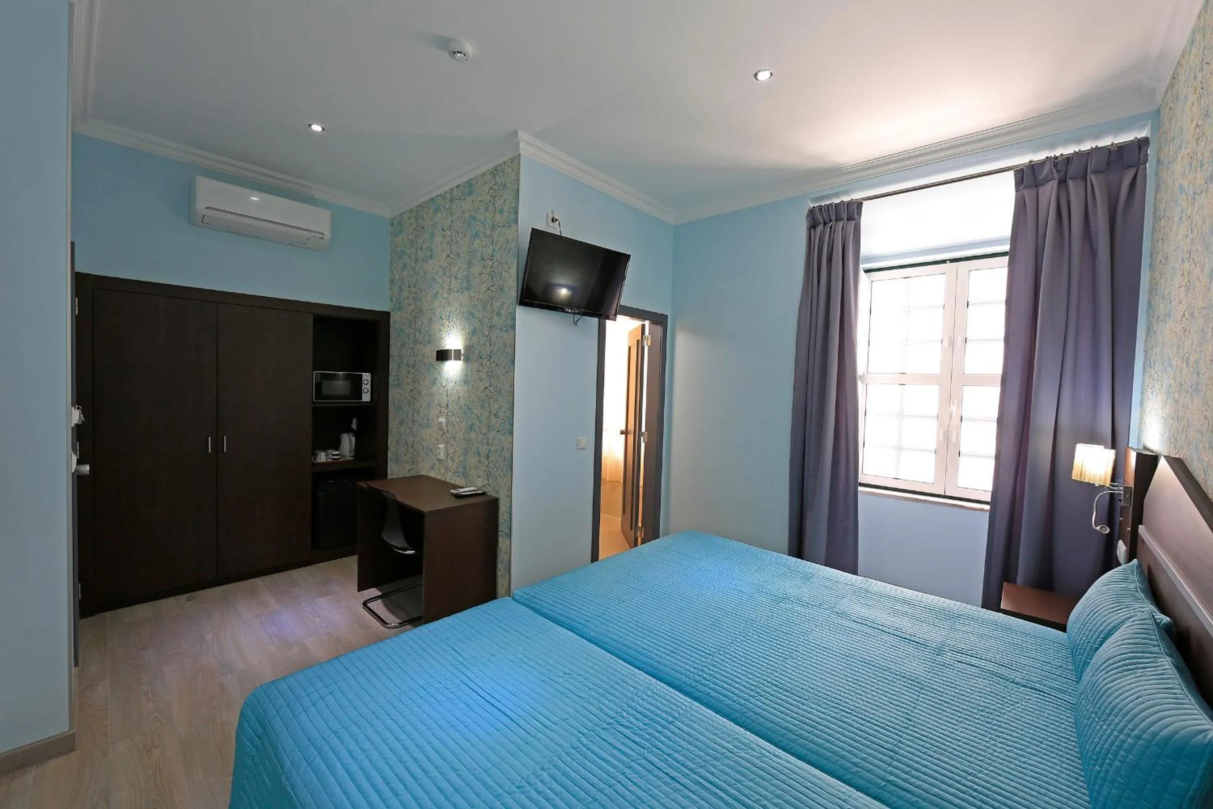 Bedroom, Bed in Pensao Praca Da Figueira