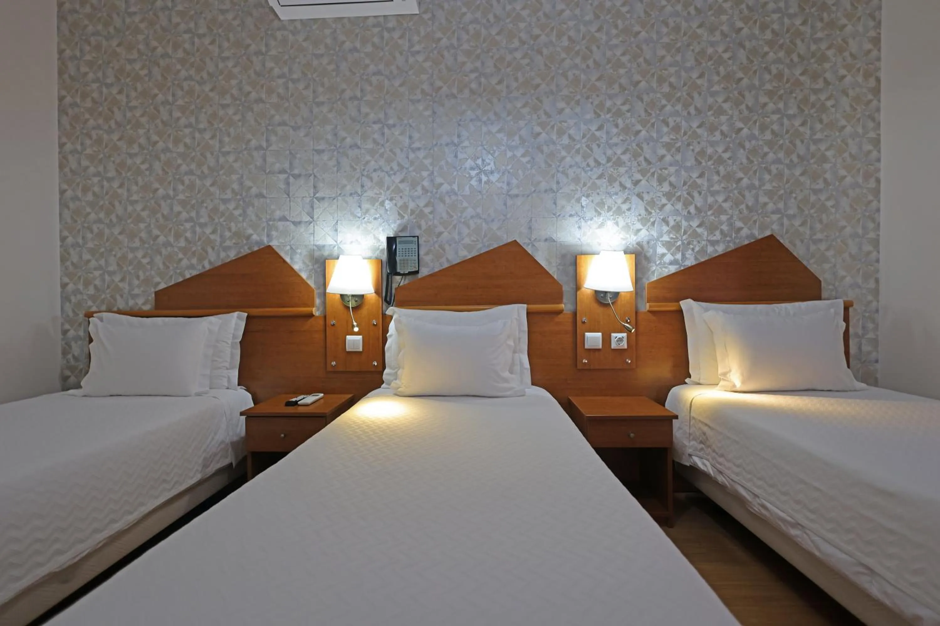 Bed in Pensao Praca Da Figueira