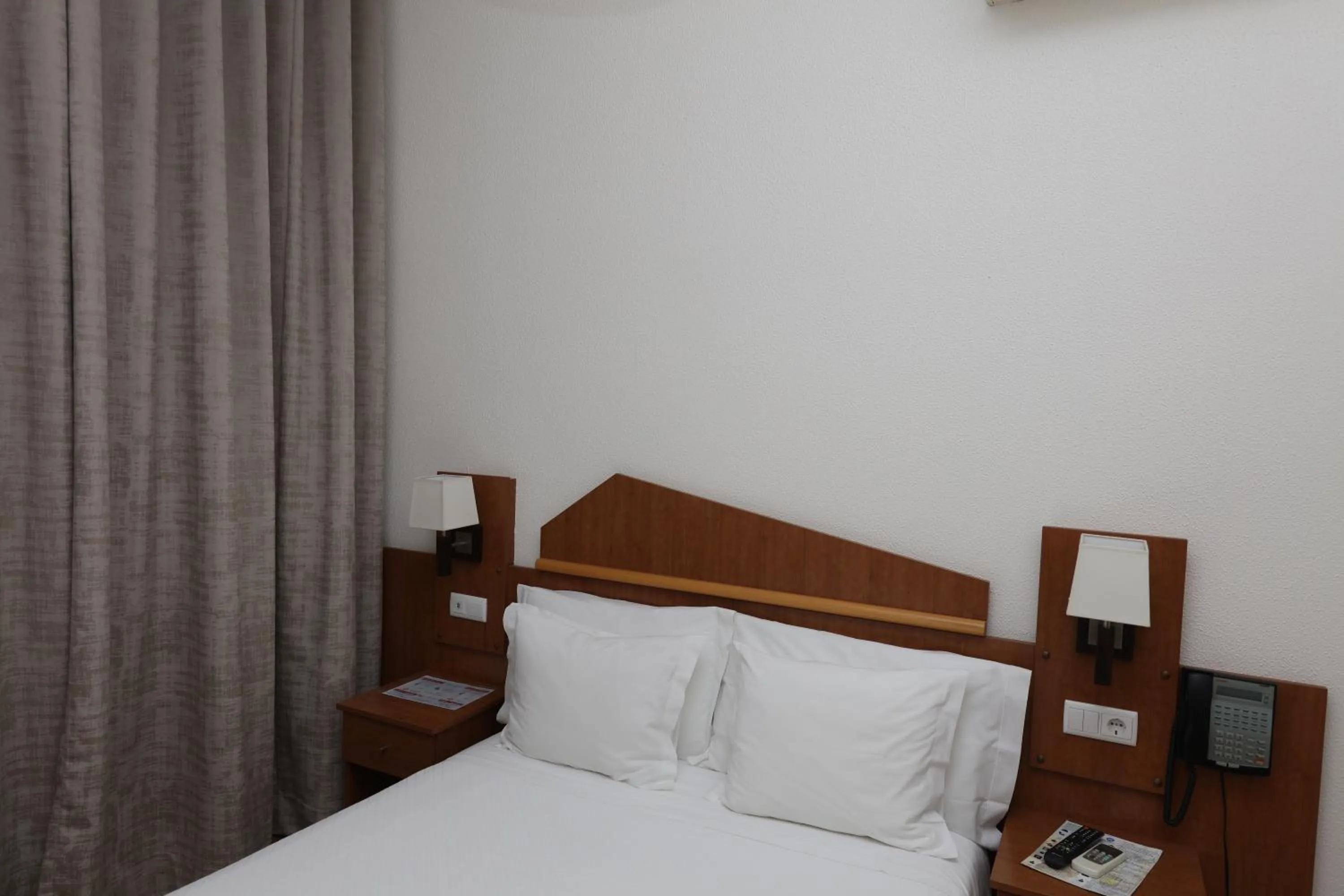 Bed in Pensao Praca Da Figueira